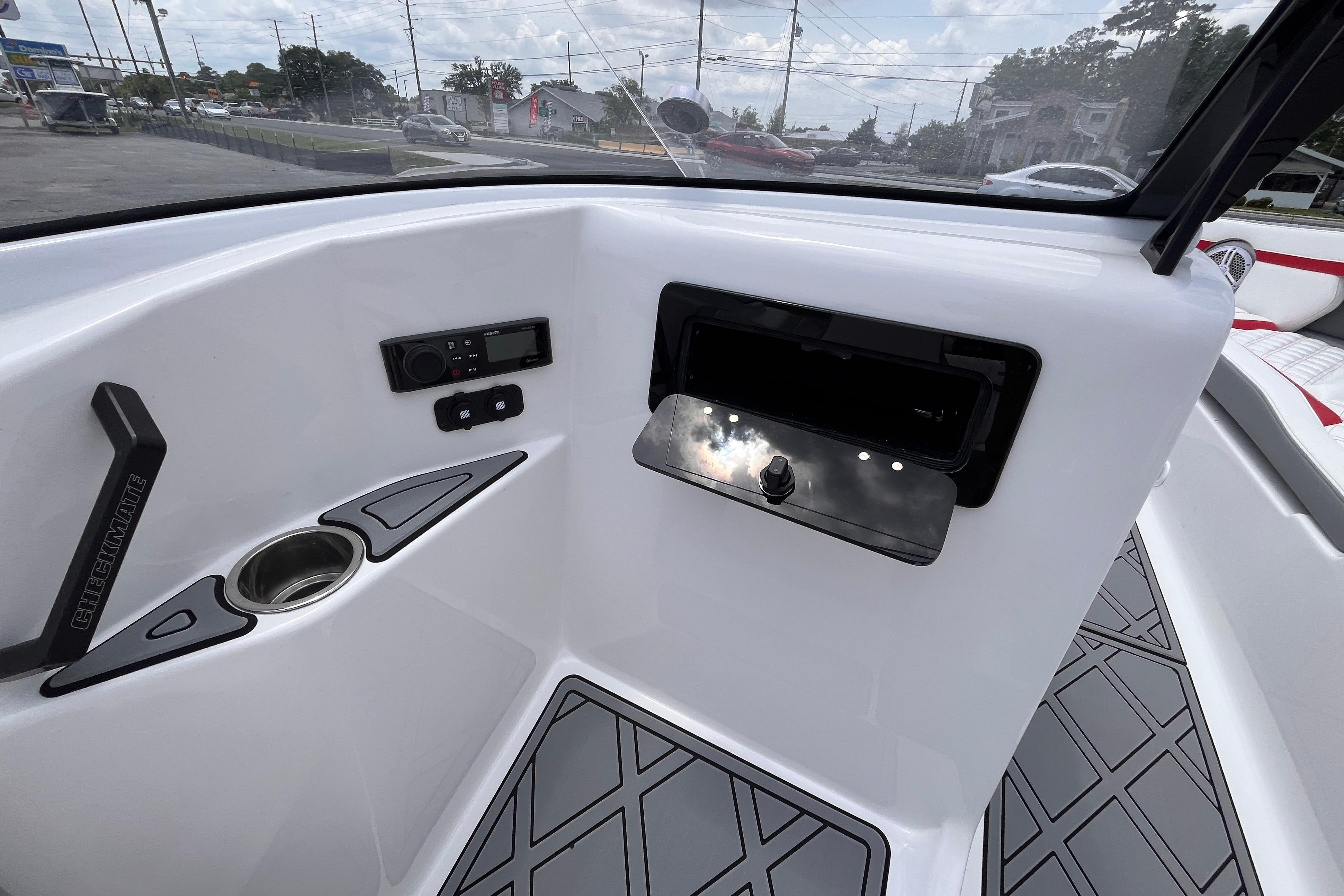 Interior of 2025 Checkmate Pulsare 2400 BRX with modern controls.