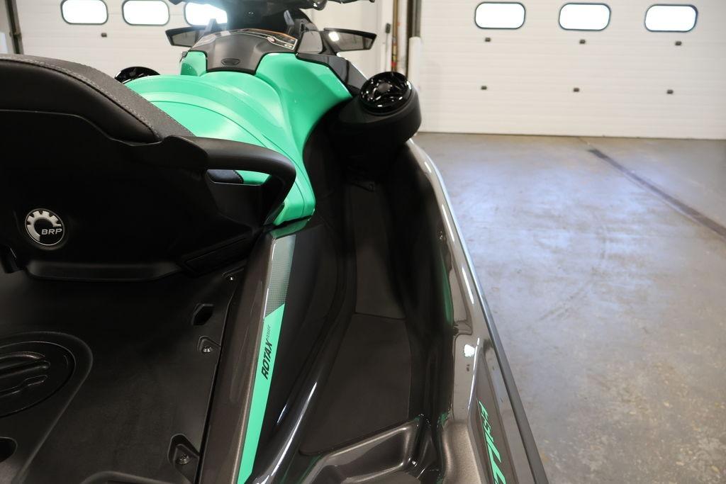 2026 Sea-Doo GTI SE 130 jet ski in a garage, showcasing sleek design and vibrant color.