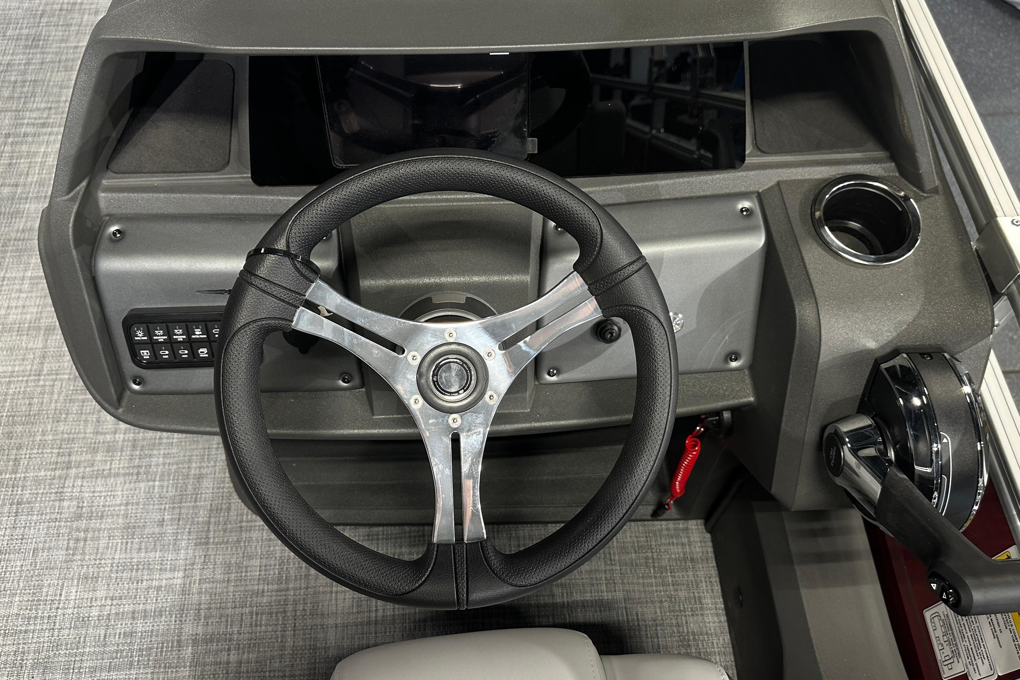 Steering console of 2026 Sun Tracker SportFish 22 DLX pontoon boat.