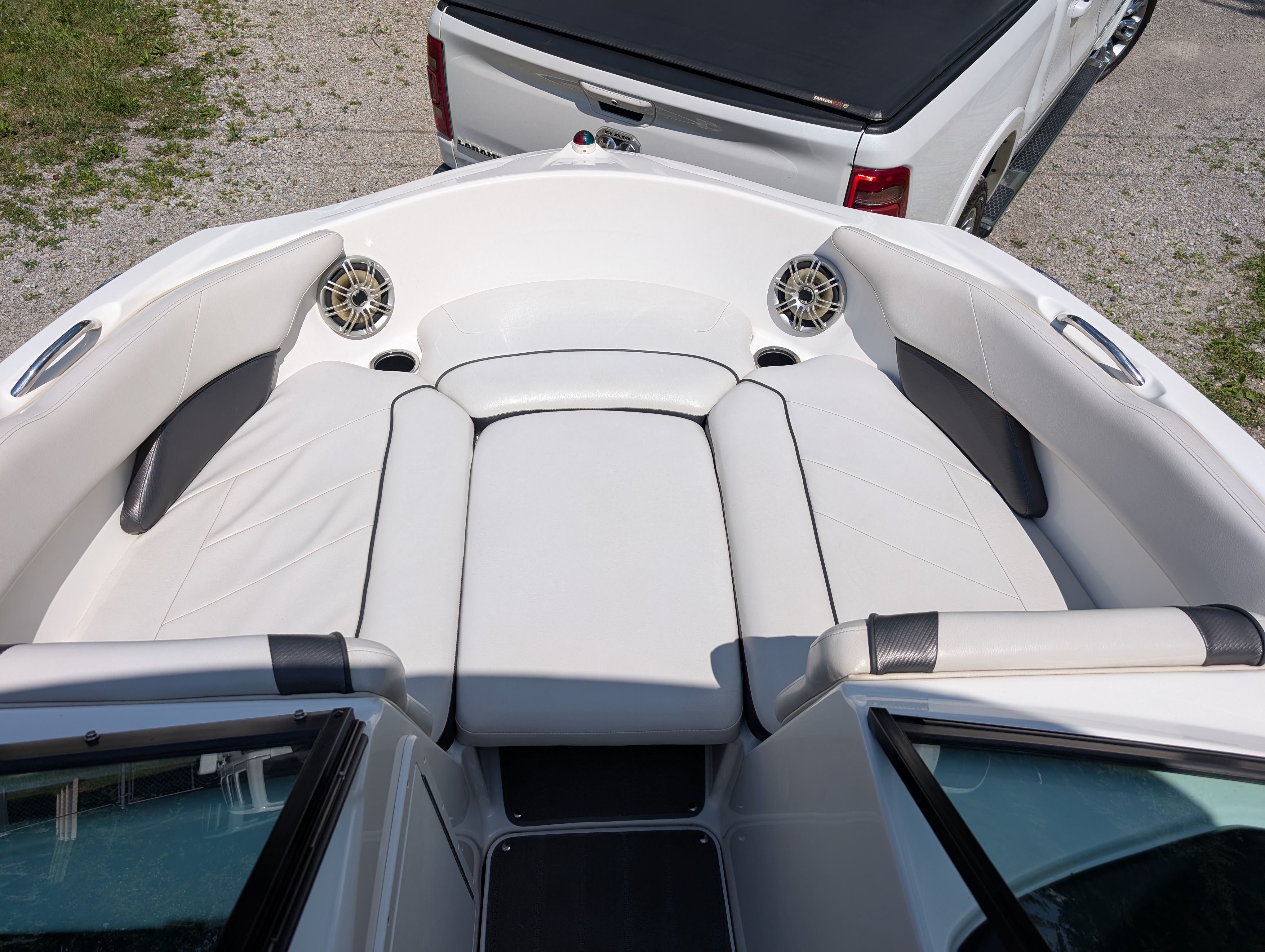 The image shows the bow of a 2014 Yamaha AR192 boat with white upholstery.