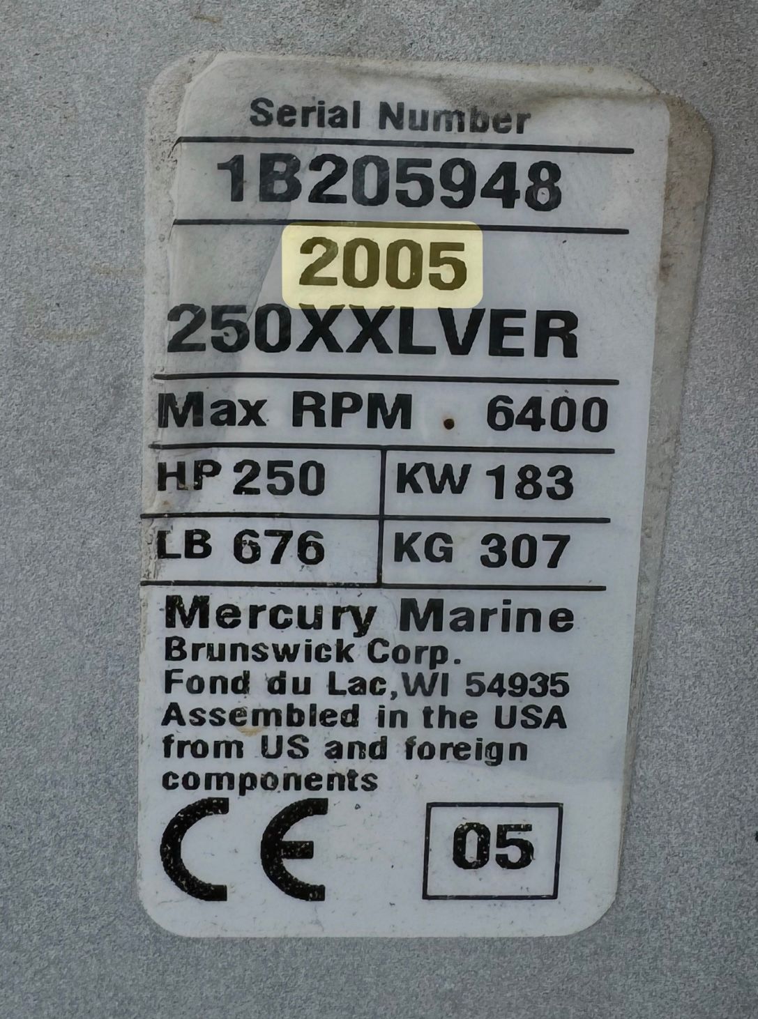 Mercury Marine engine label with serial number and specifications.