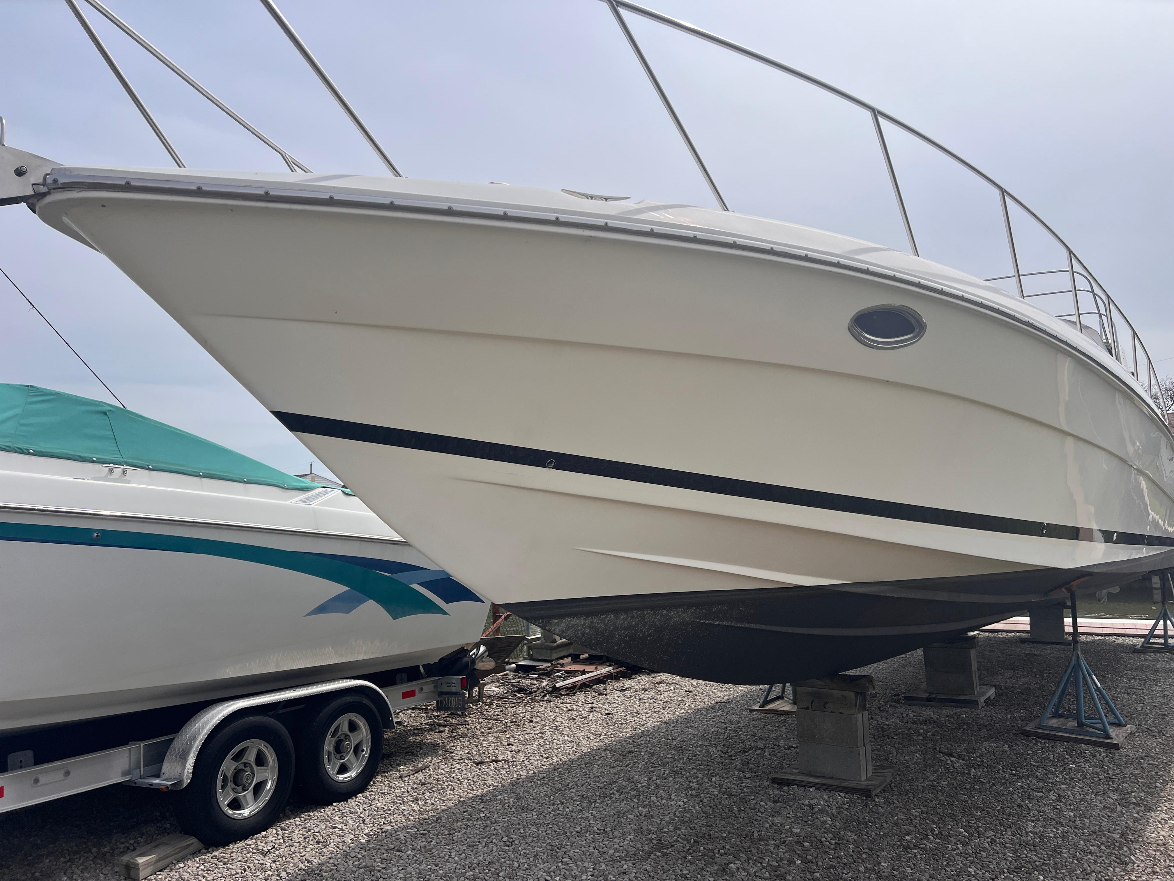 Wellcraft 45 Excalibur 2000 on stands, side view.