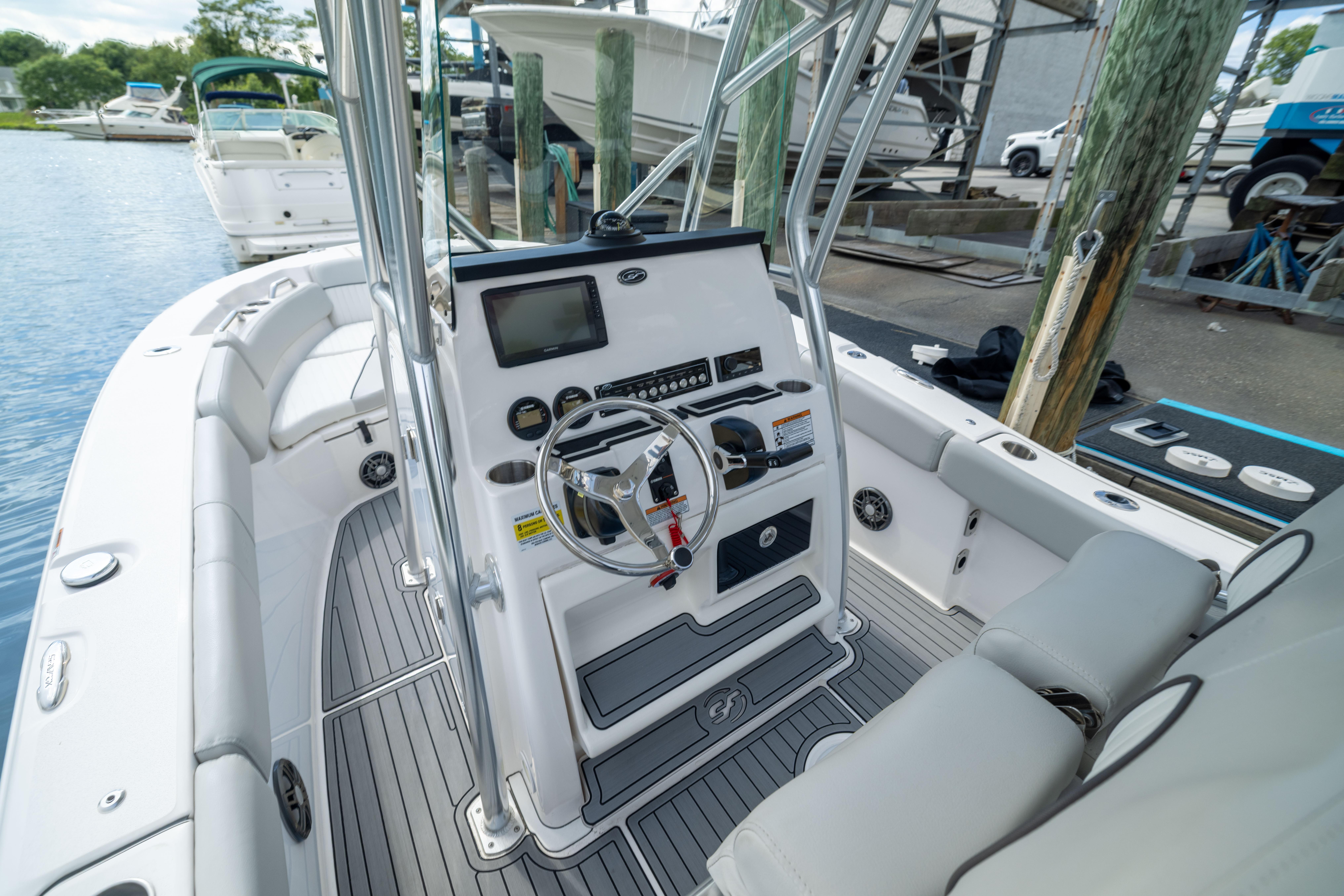 2023 Sea Fox 228 Commander boat interior with modern helm and seating.