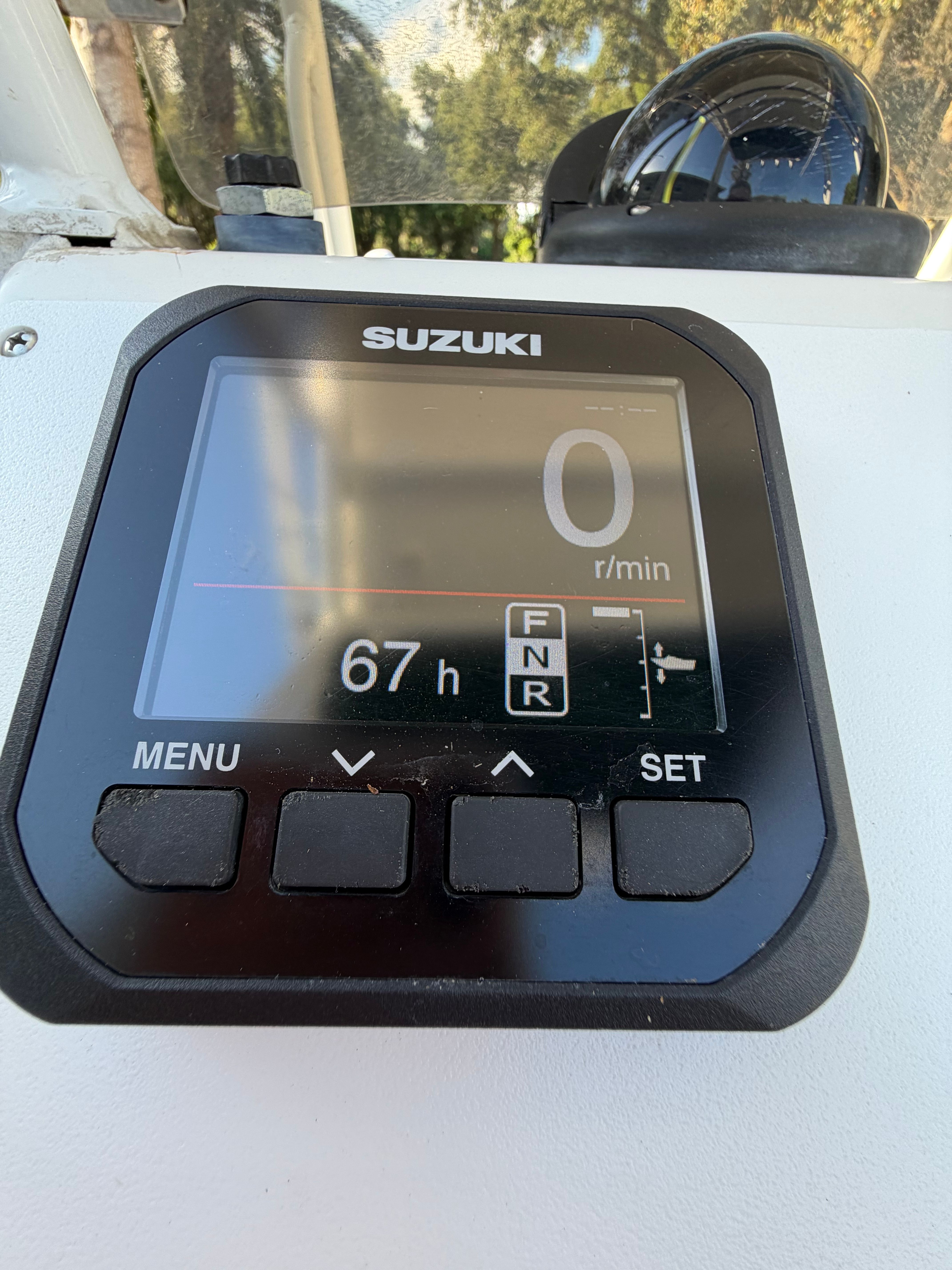 Suzuki engine display on Skeeter ZX2200 boat, 67 hours logged.
