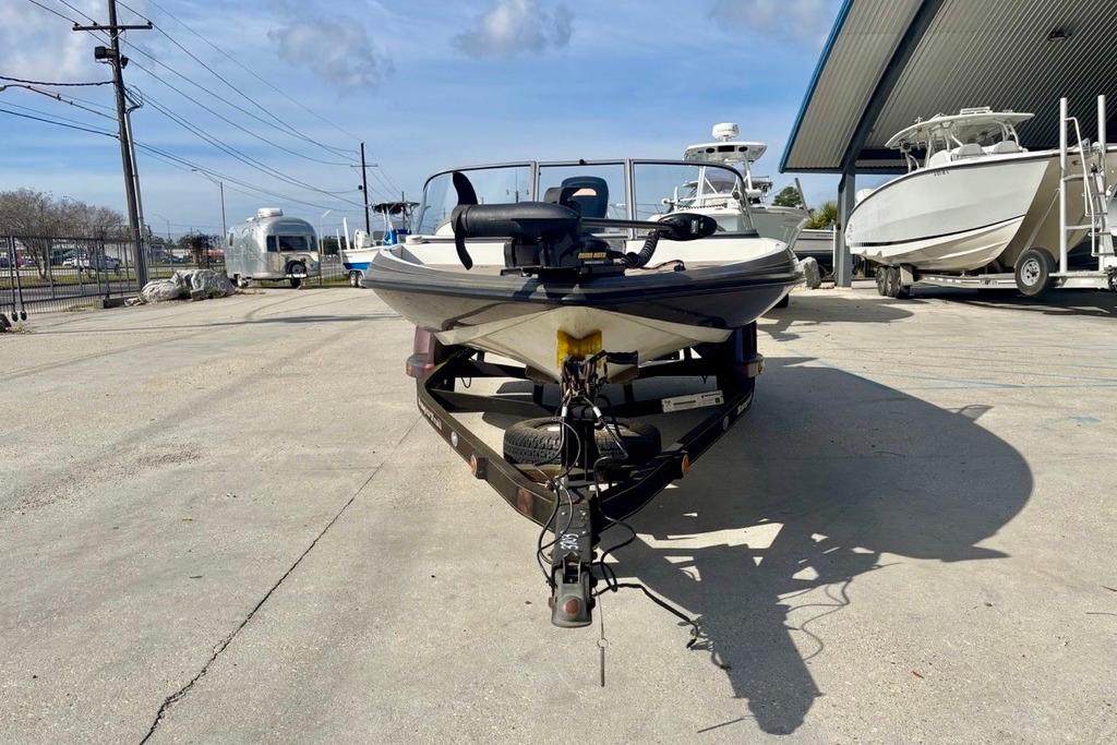 2008 Ranger 180 Reata boat on trailer in outdoor storage area.
