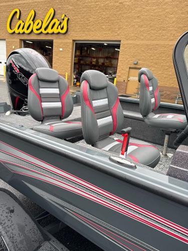 2024 Ranger VS1782SC Angler boat with stylish seating, displayed outside Cabela's store.