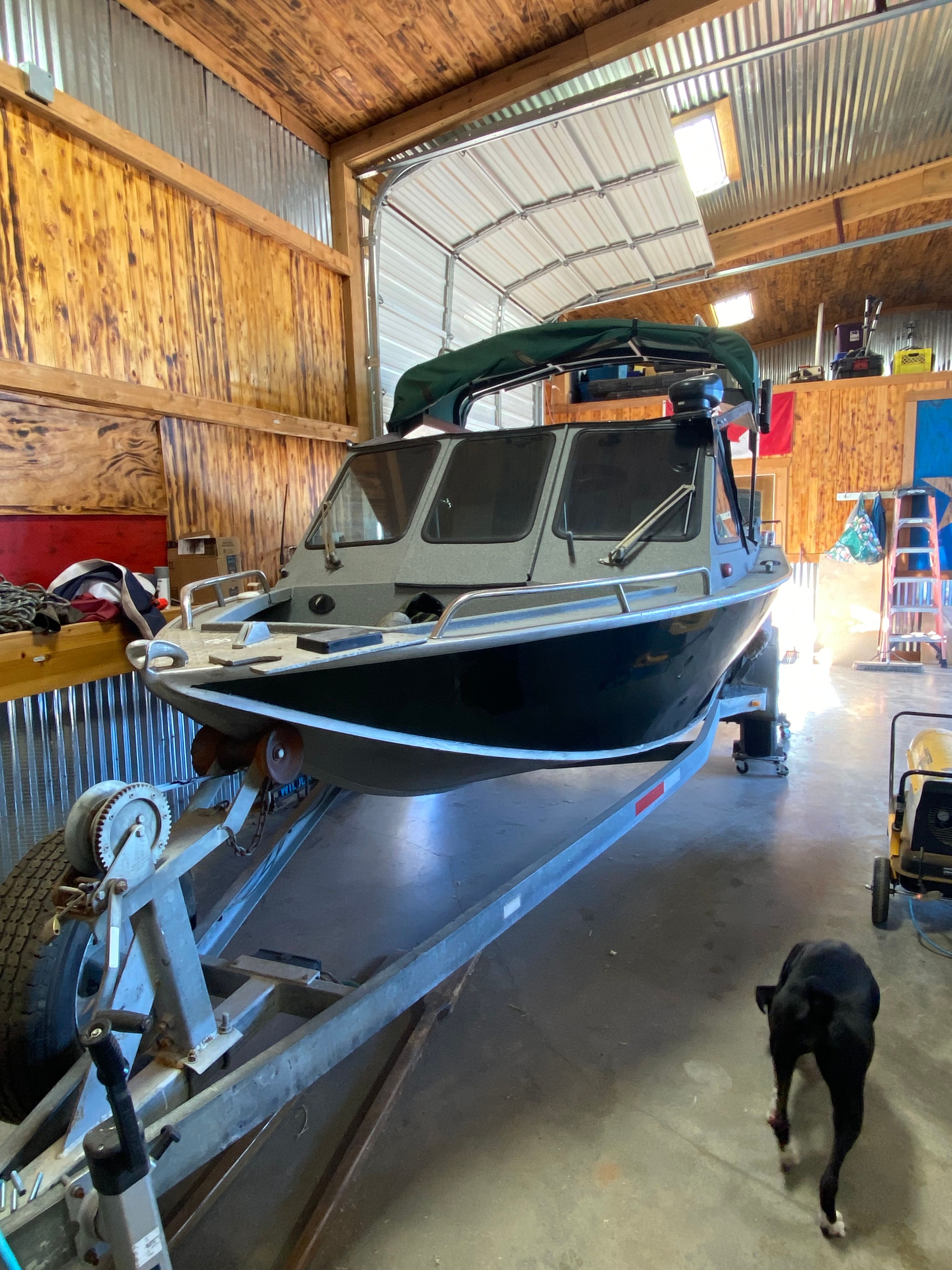 1993 Jetcraft Fastwater boat on trailer in barn.