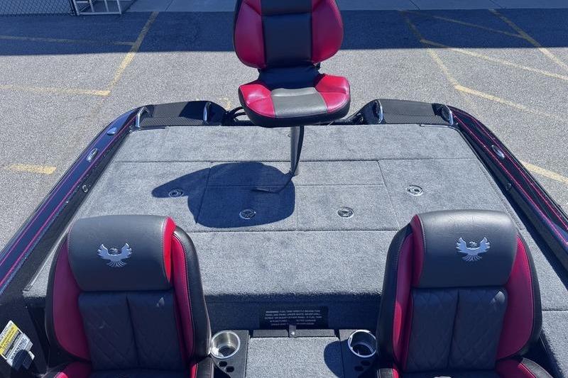 2026 Phoenix 819 ZXL boat interior with red and black seating, spacious deck.