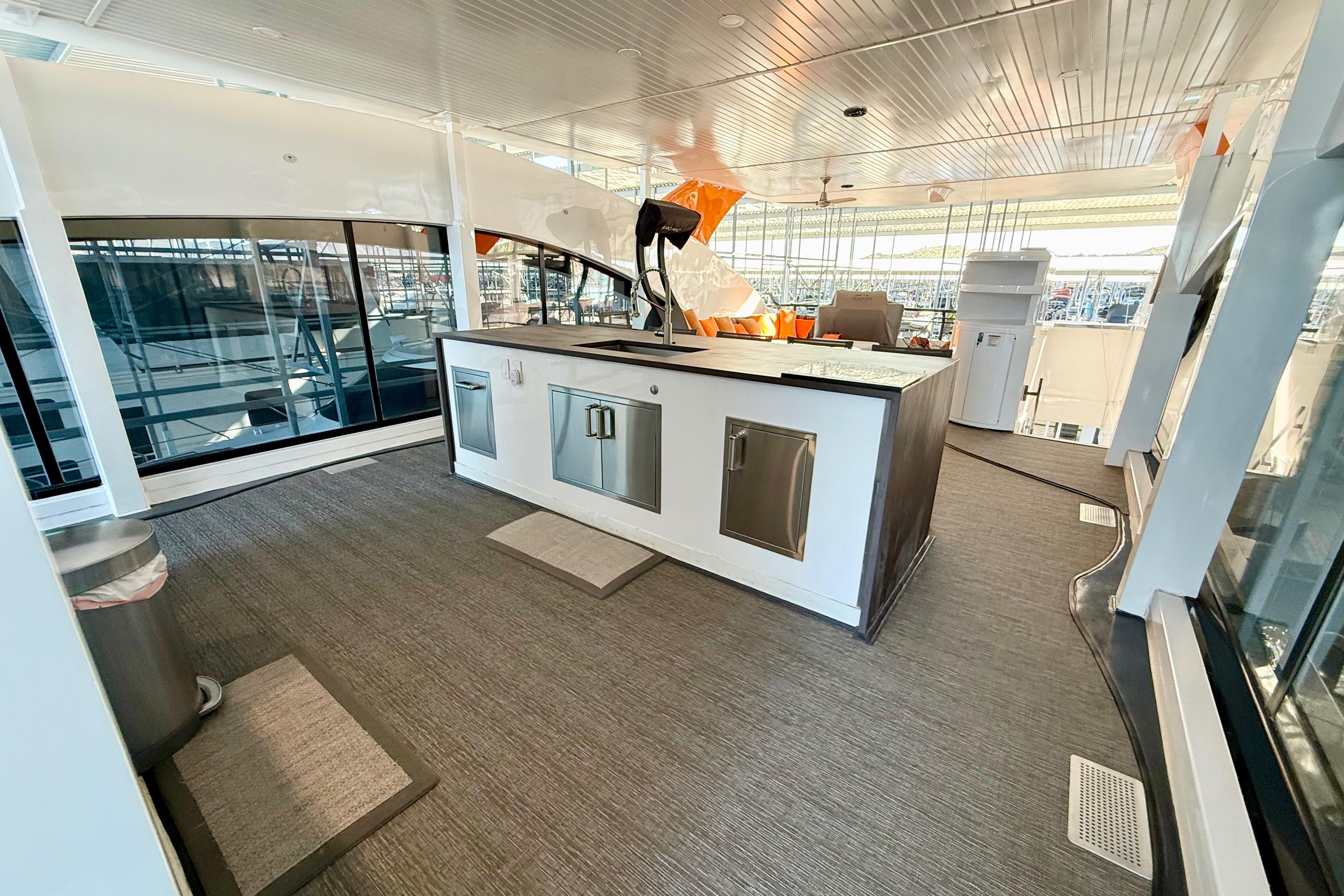 Luxurious interior of 2021 BRAVADA YACHTS Atlas V Series 8018 with modern kitchen amenities.