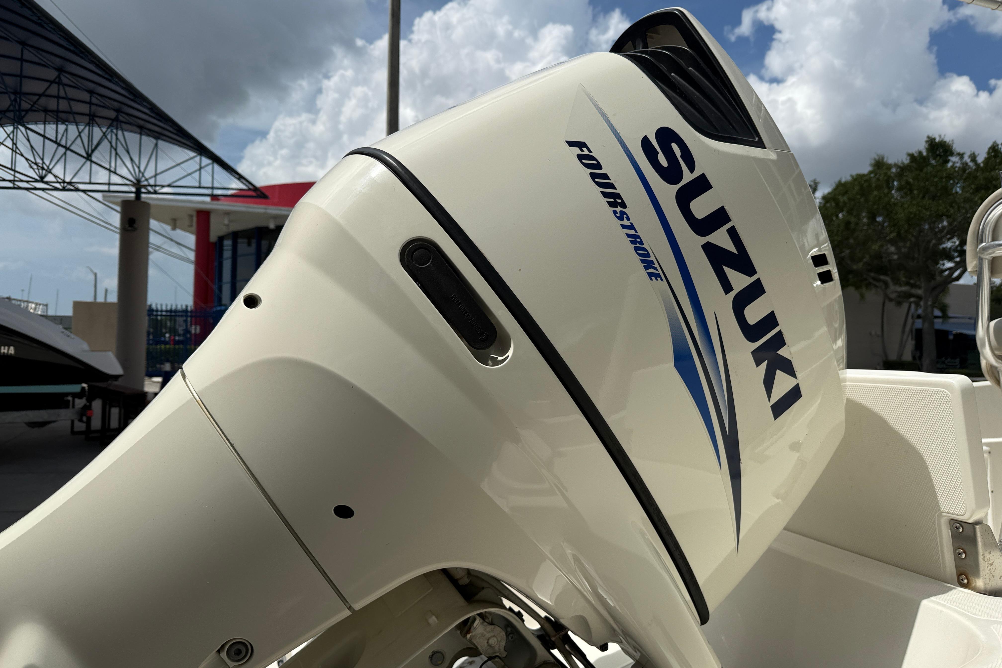 Suzuki four-stroke outboard motor on a 2015 NauticStar 231 Coastal boat.