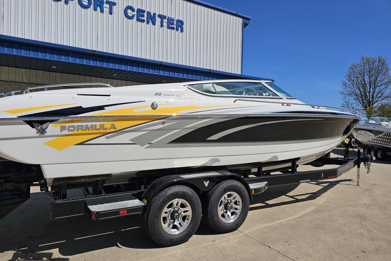 2014 Formula 292 FASTech boat on trailer at a sport center, showcasing sleek design.