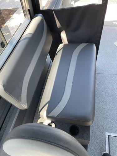 2024 Spartan 220 Maximus interior seating with gray upholstery and modern design.