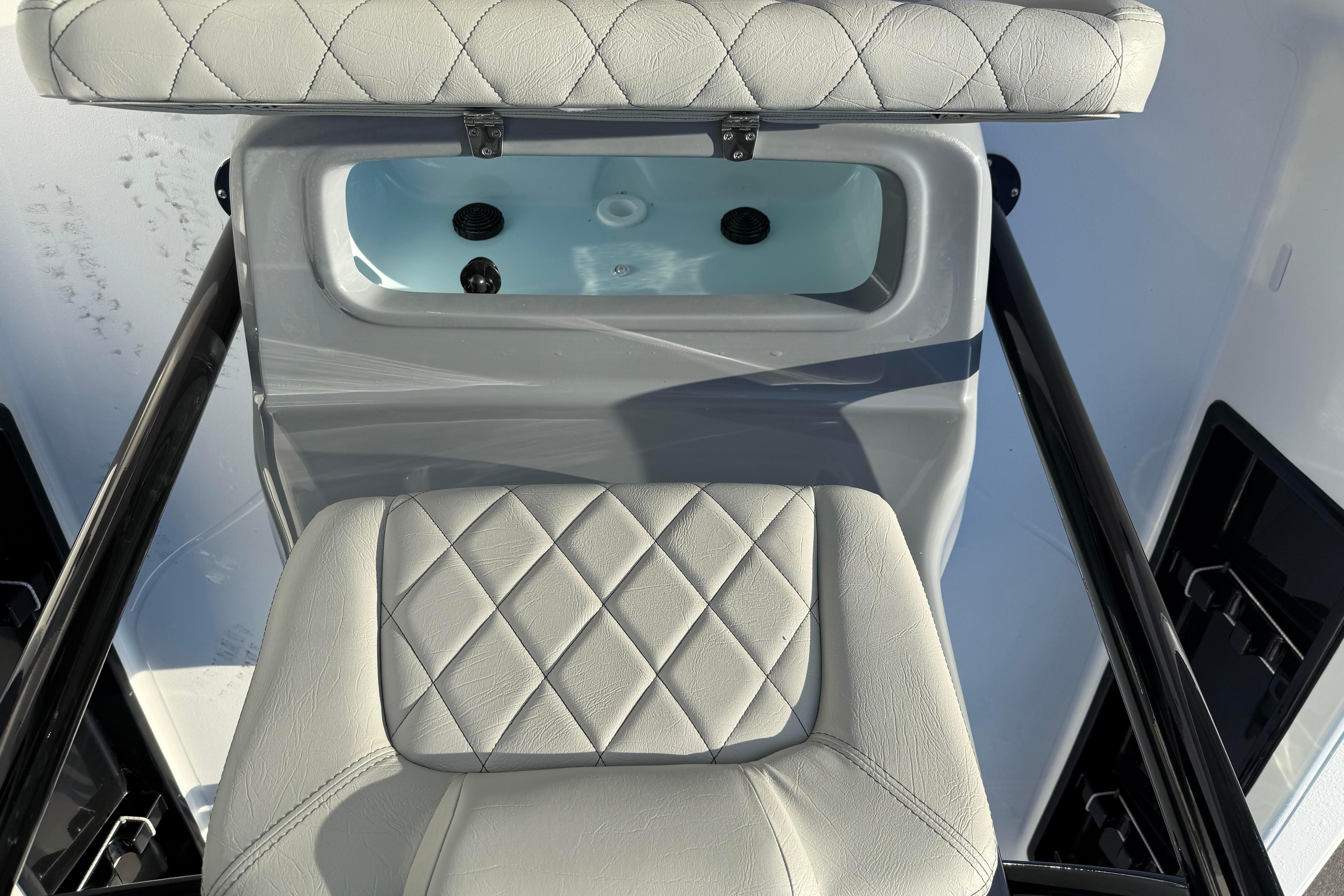 2026 Blazer Bay PURE BAY 2200 boat interior with quilted seating and livewell.
