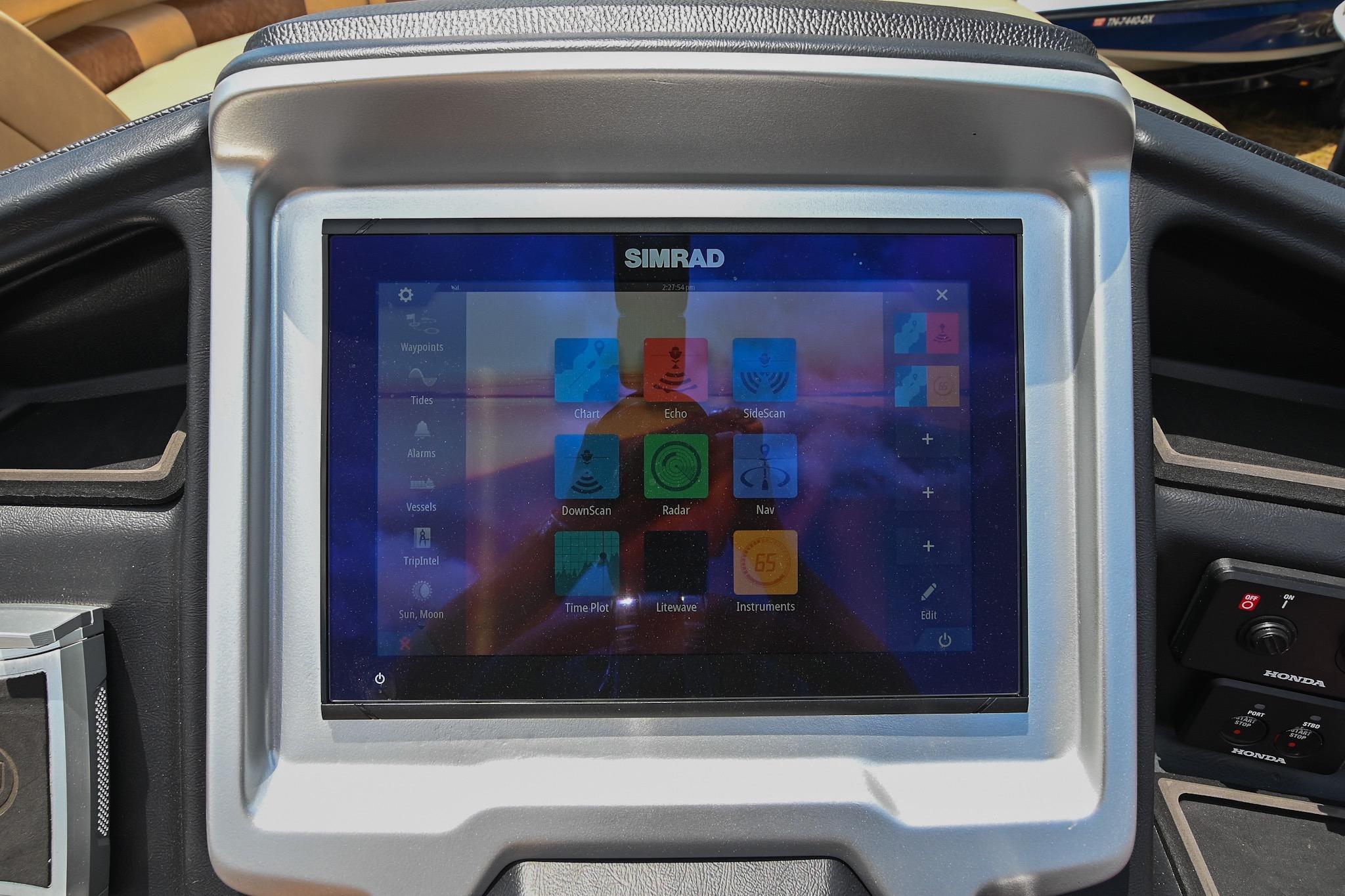 Simrad touchscreen display on 2023 Premier 270 Intrigue RF boat dashboard.