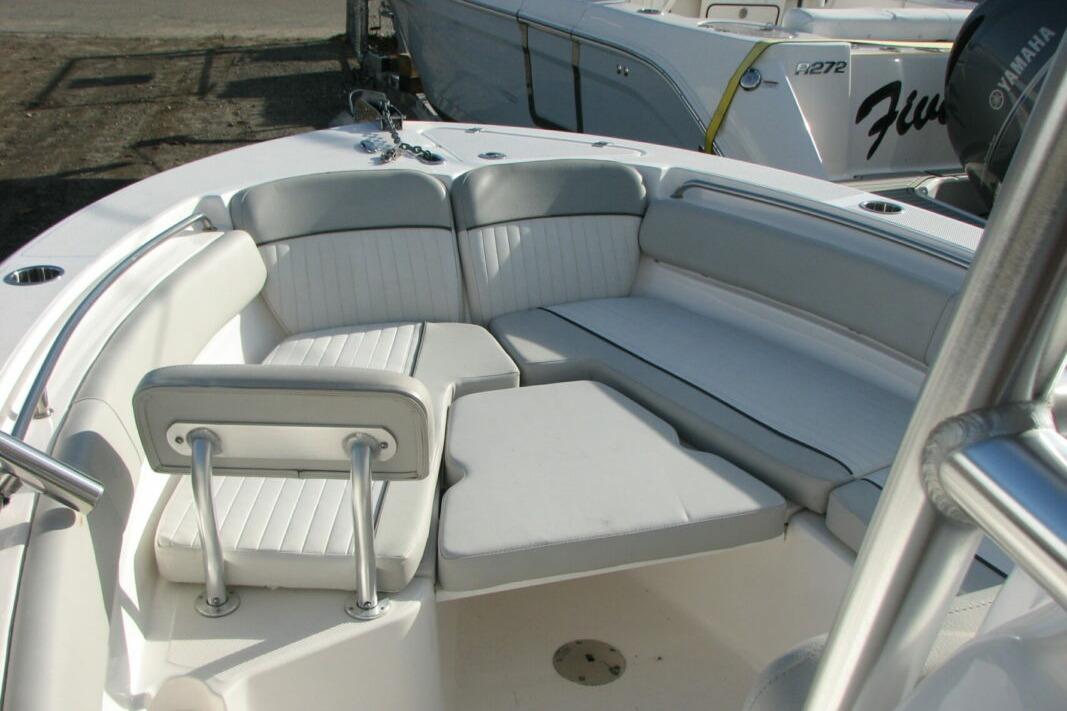 2020 Sea Fox 249 Avenger boat interior with cushioned seating area.