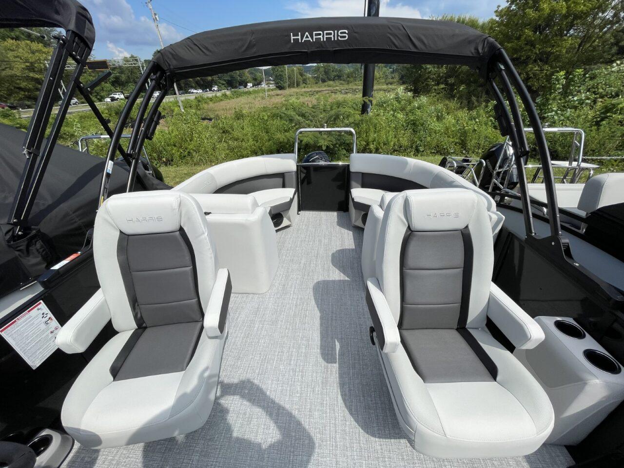 2026 Harris Cruiser 230 interior with plush seating and modern design.