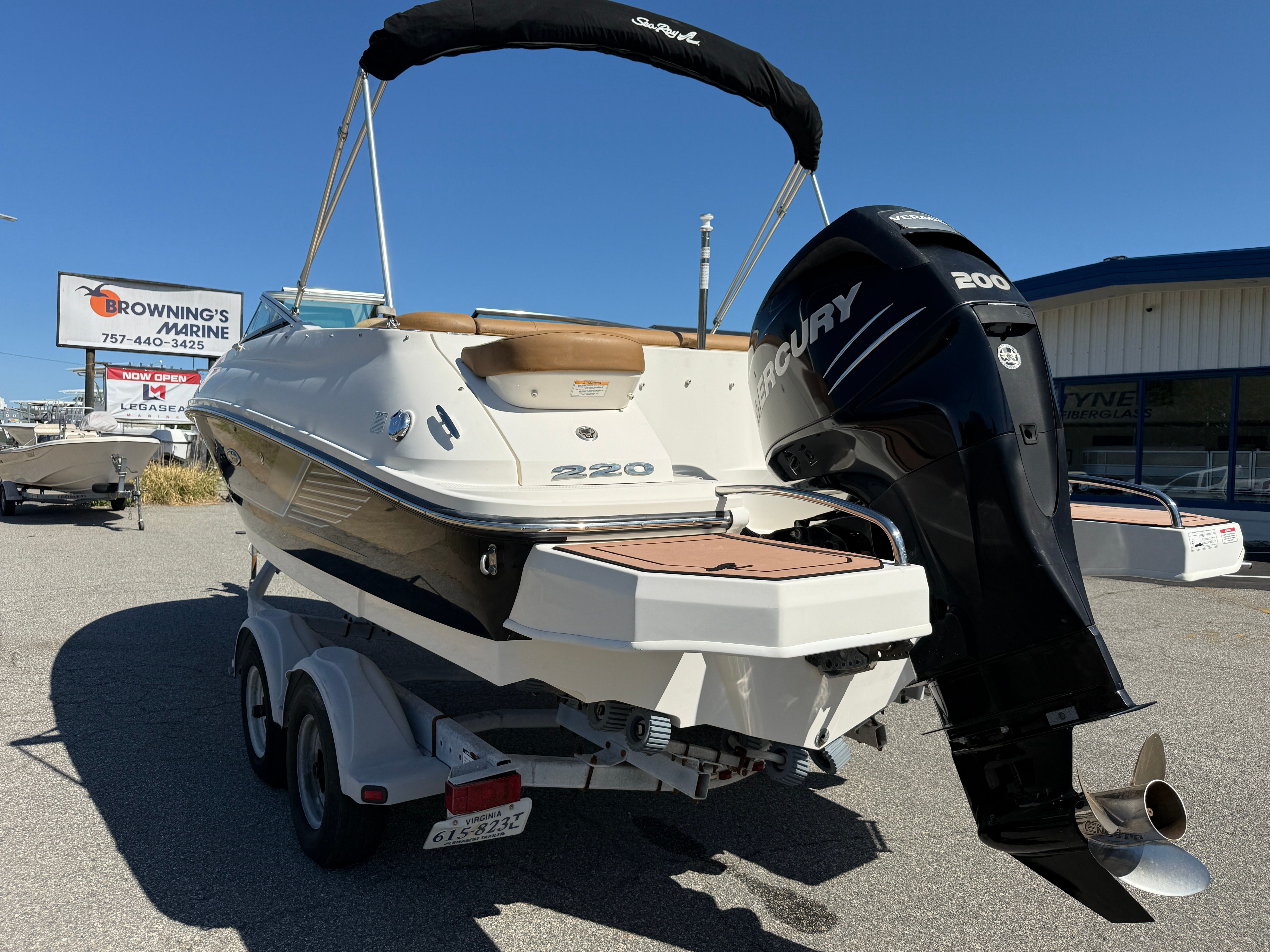 2015 Sea Ray 220 Sundeck OB boat with Mercury engine.