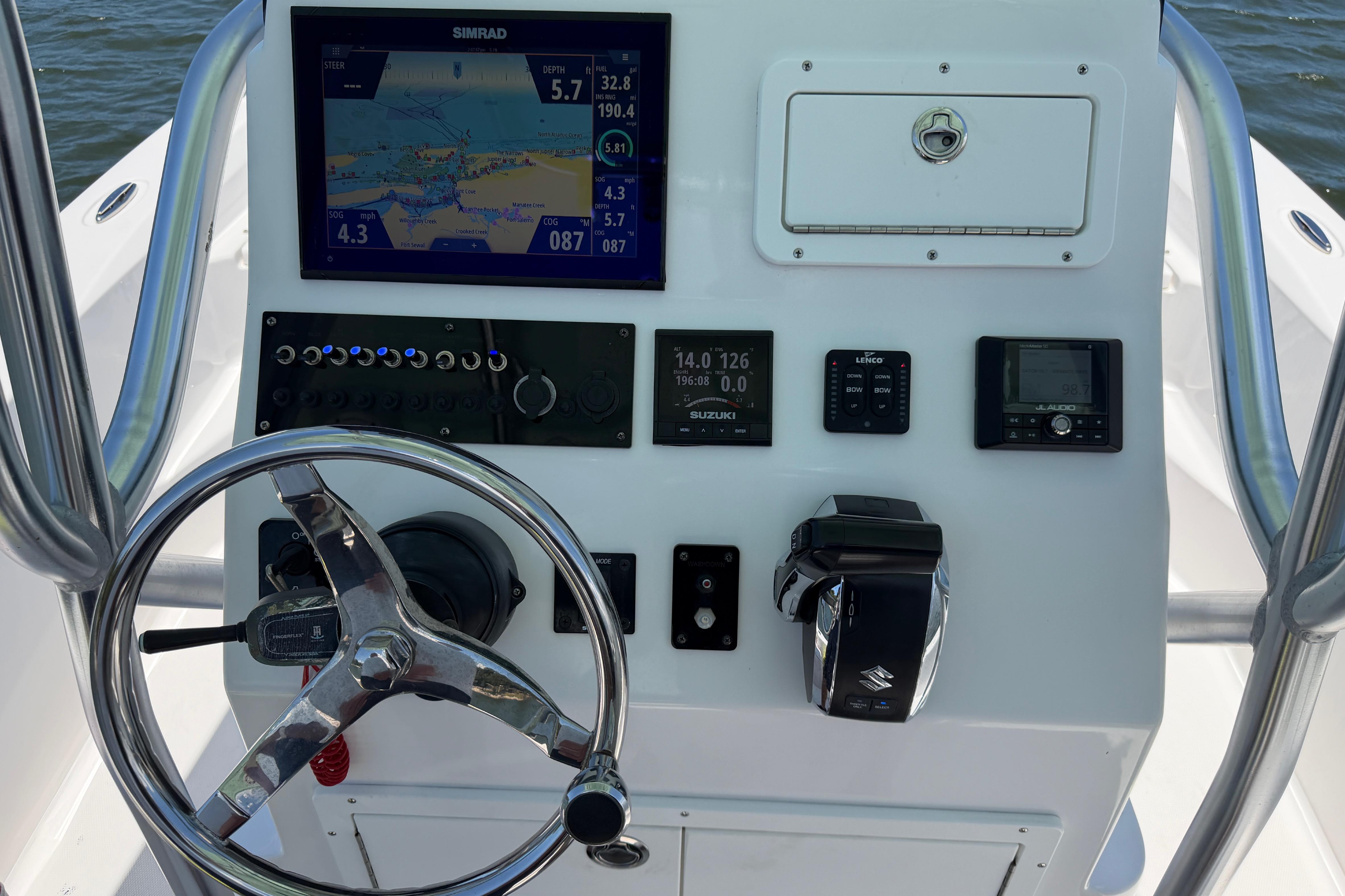 2022 Aquasport 230 Pro Bay boat dashboard with navigation and control systems.