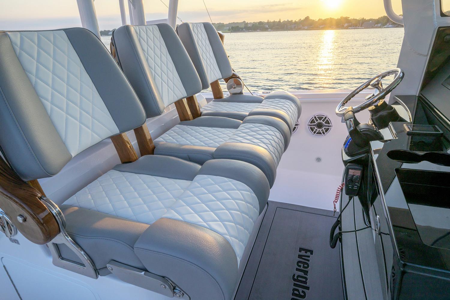 Manufacturer Provided Image: Luxurious seating on 2026 Everglades 335 Center Console boat at sunset.