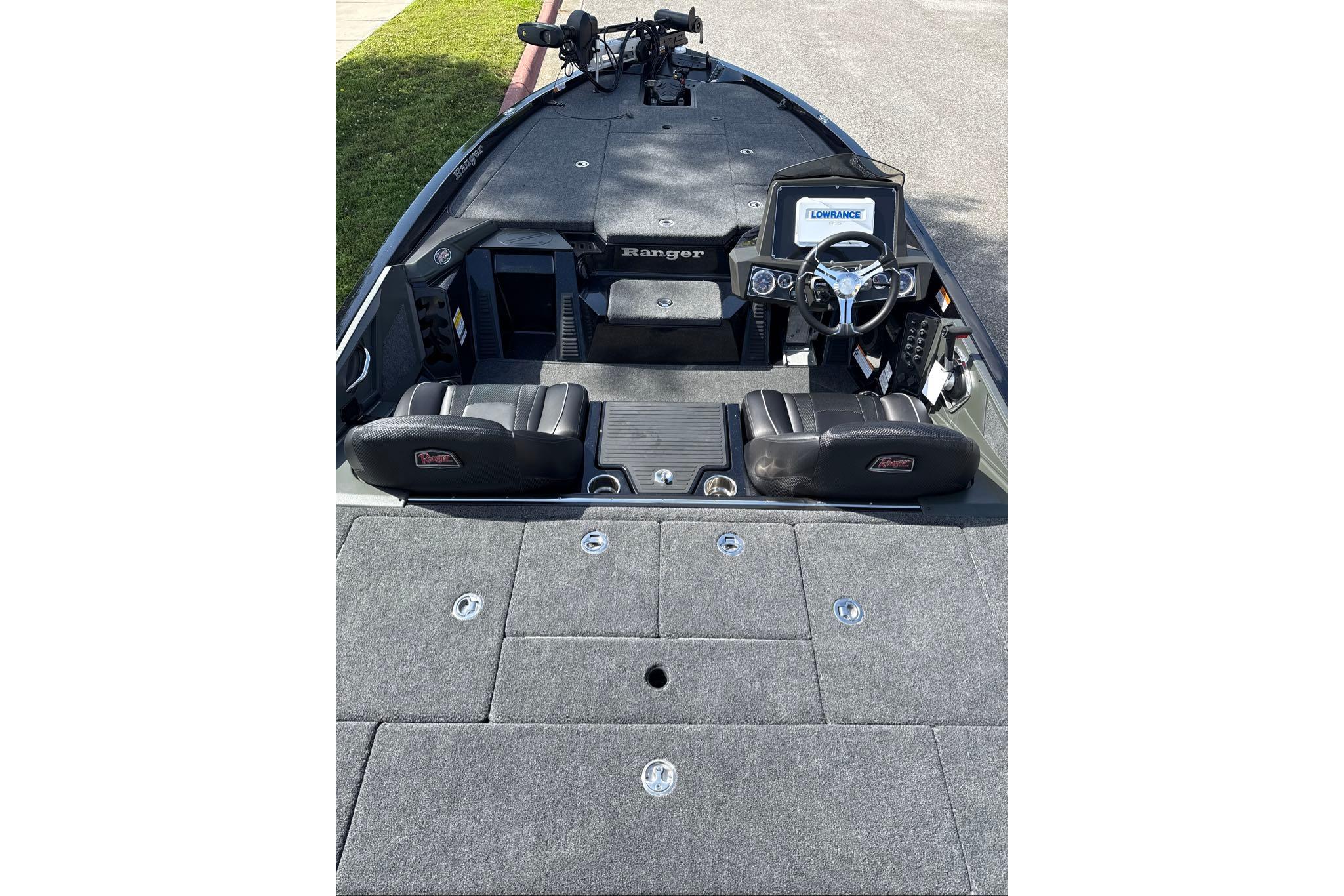 2026 Ranger Z518 boat interior with steering wheel, seats, and Lowrance display.