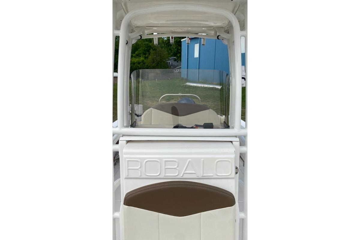 2017 Robalo R222 Center Console boat interior with windshield and seating.