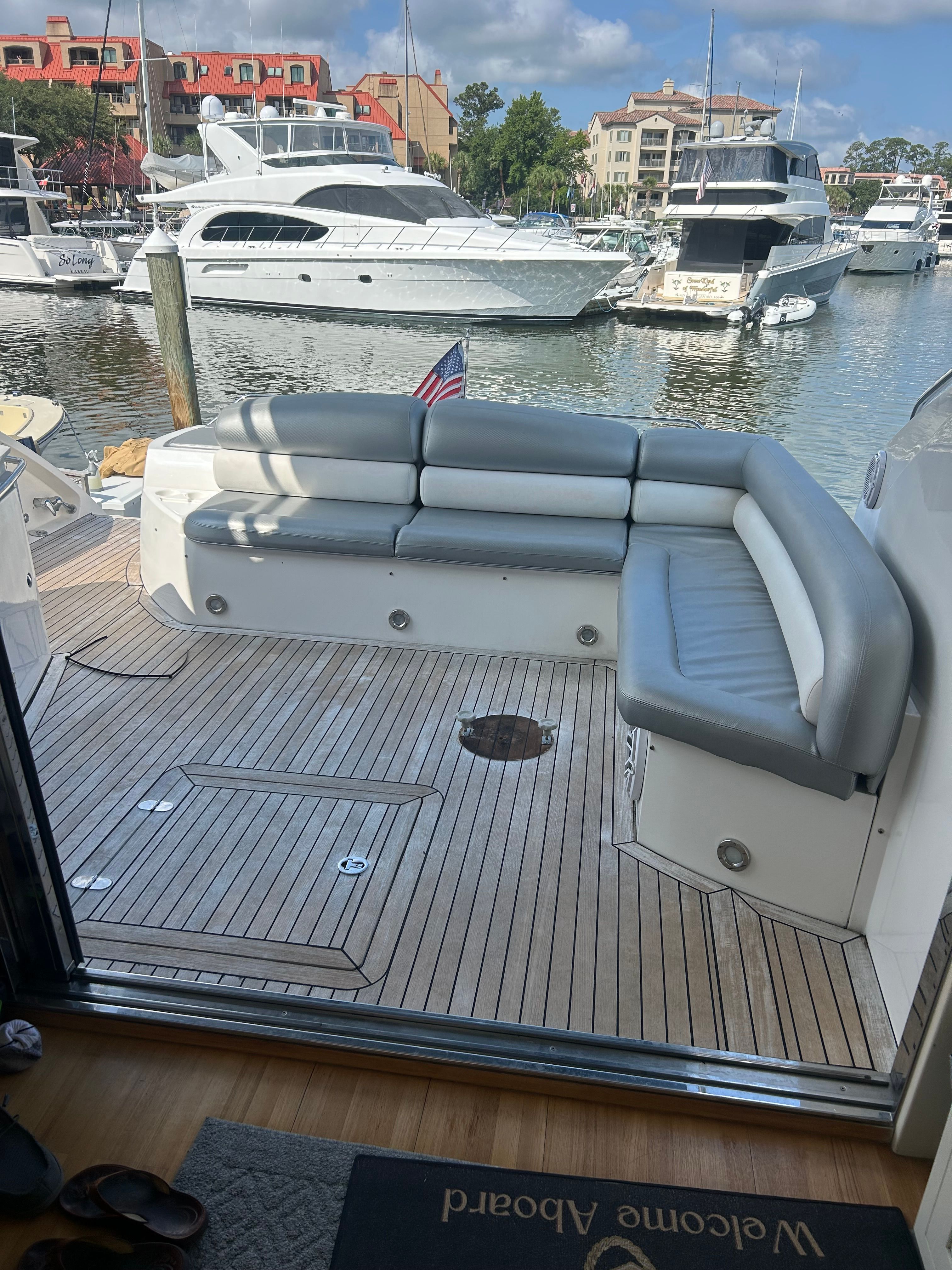 Sunseeker Predator 62 Yacht, 2008, featuring elegant seating in harbor.