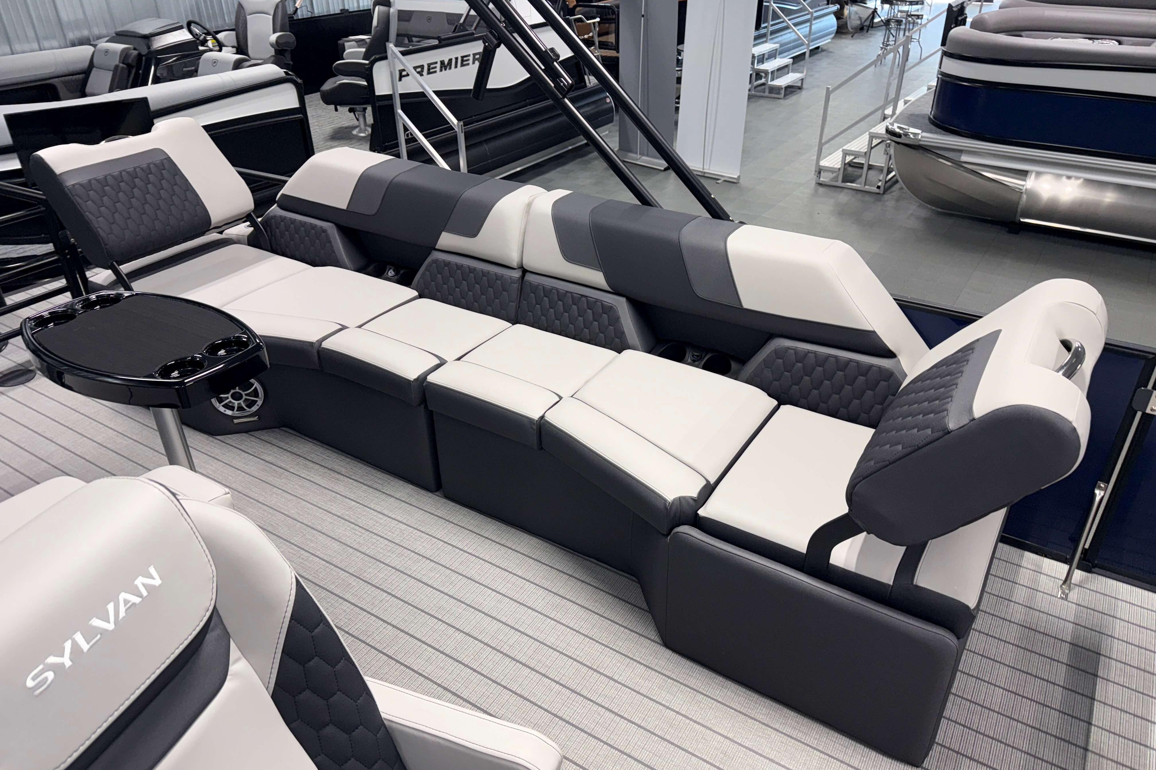 Luxurious seating on 2026 Sylvan L3 SLZ pontoon boat with modern design and comfort.