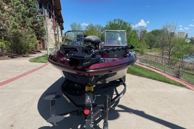 2026 Nitro ZV20 Pro boat on trailer, parked outdoors on a sunny day.