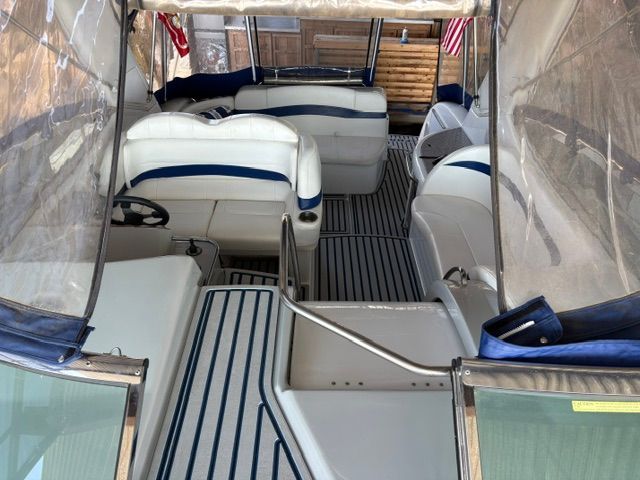 Interior of a 2007 Formula 34 Performance Cruiser with white and blue seating.