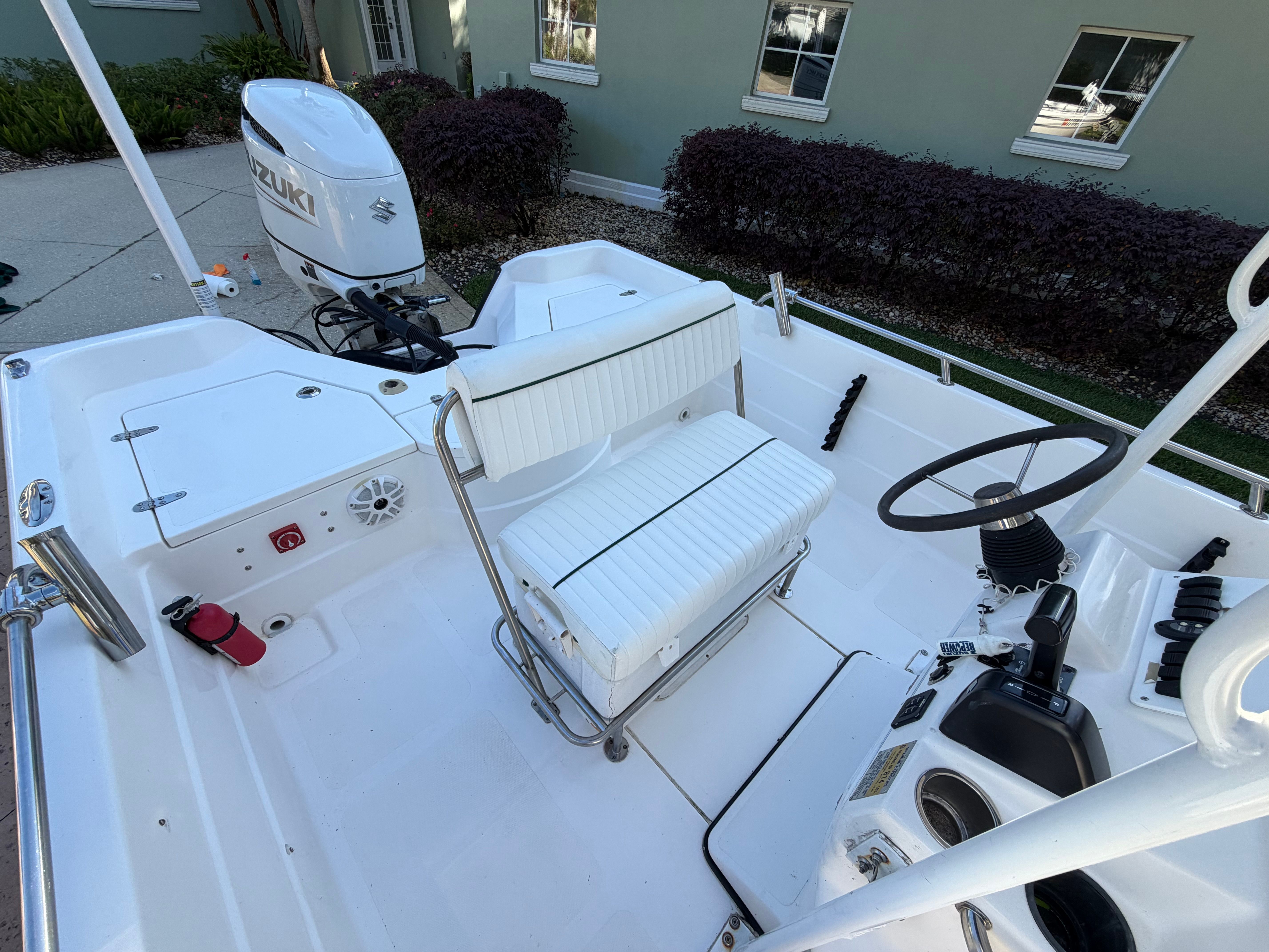Interior view of a 1999 Skeeter ZX2200 boat with Suzuki engine.