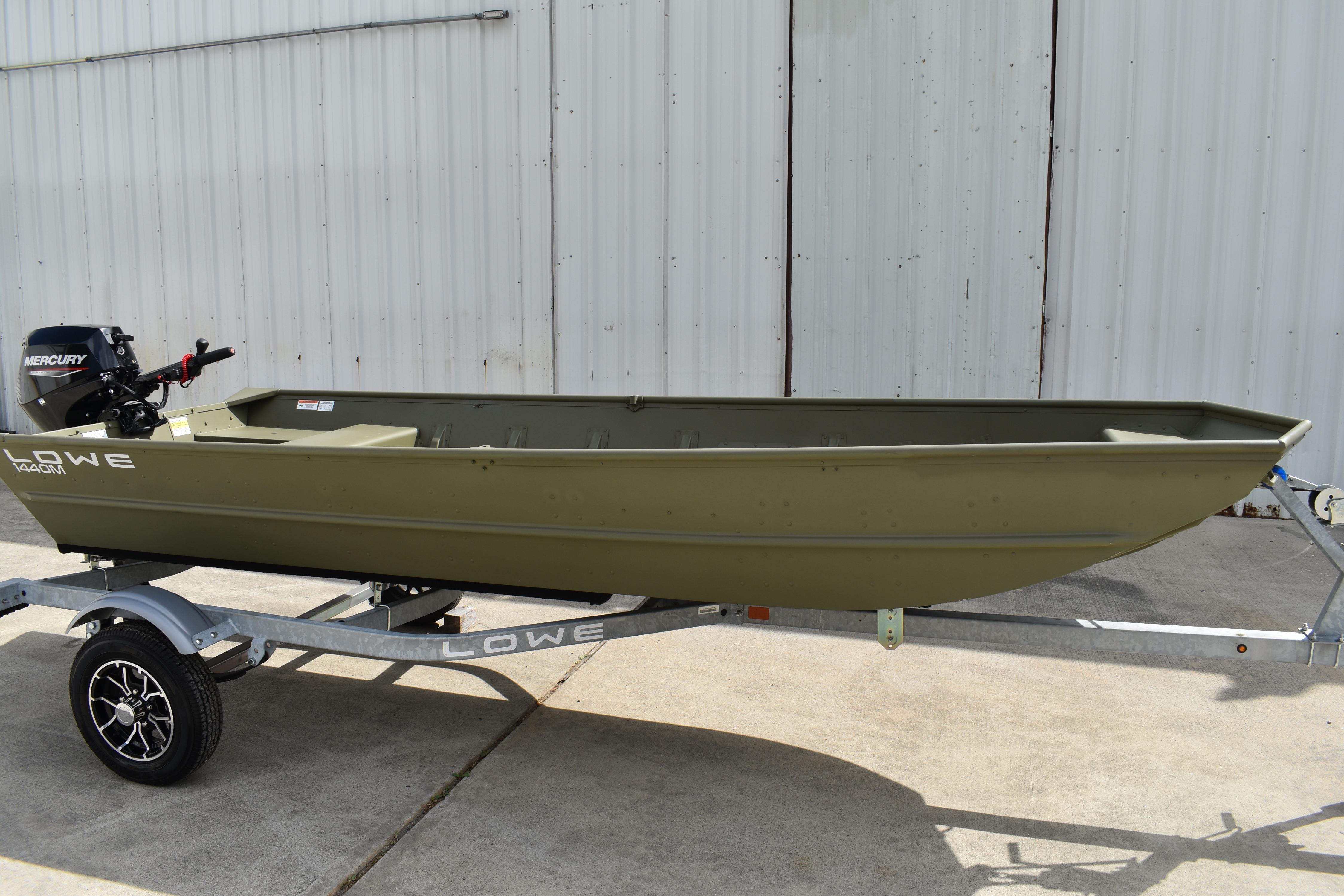 2024 Lowe L1440M Jon boat on trailer, featuring Mercury outboard motor.