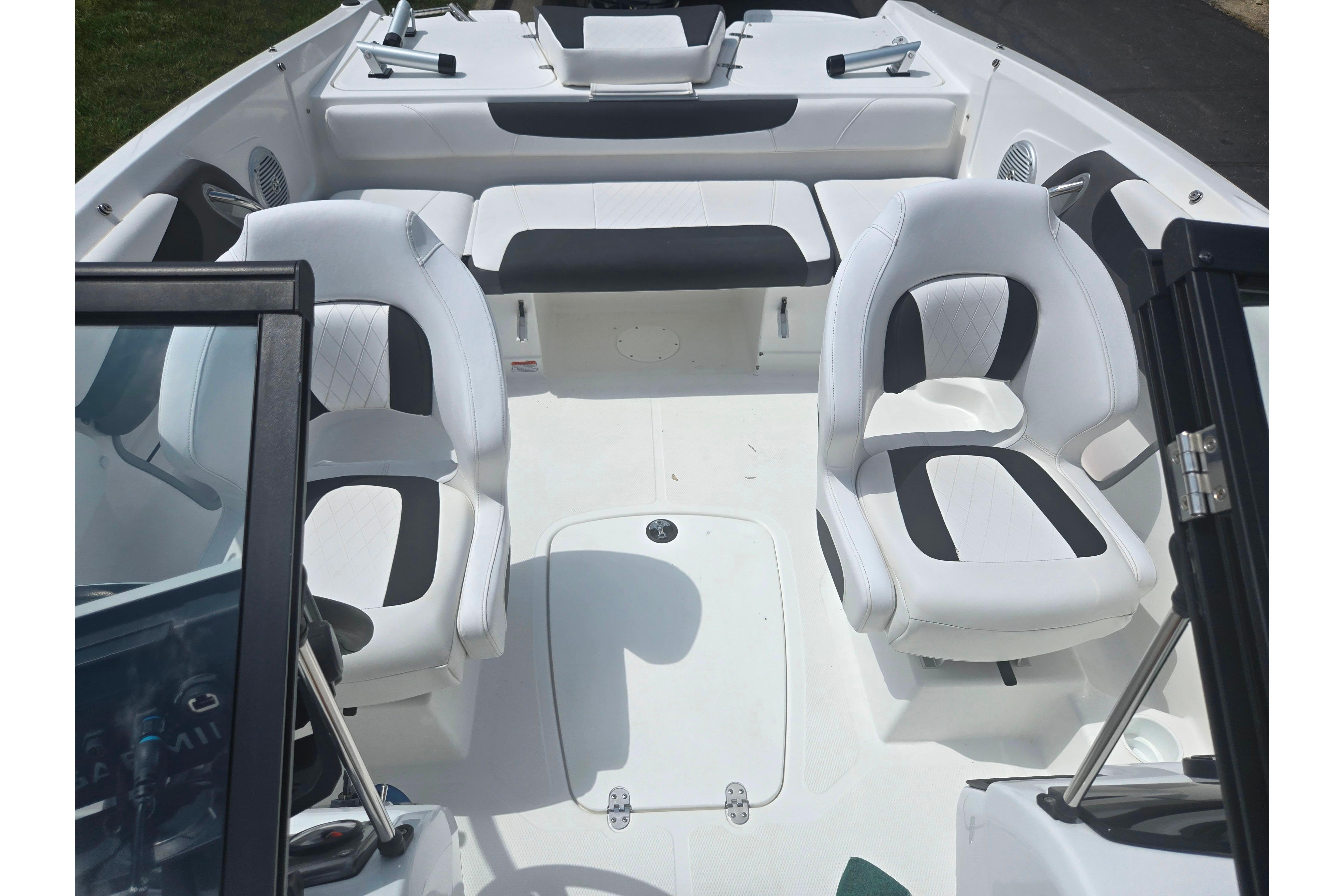 2023 Tahoe 200 S boat interior with white seating and modern design.