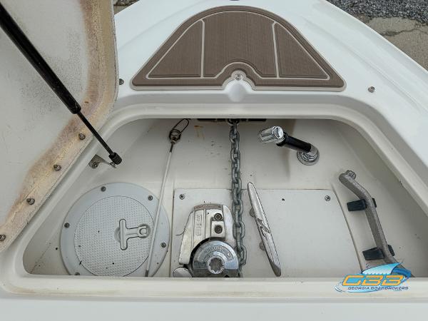 Anchor compartment of 2008 Sea Ray 270 SLX boat with chain and winch.