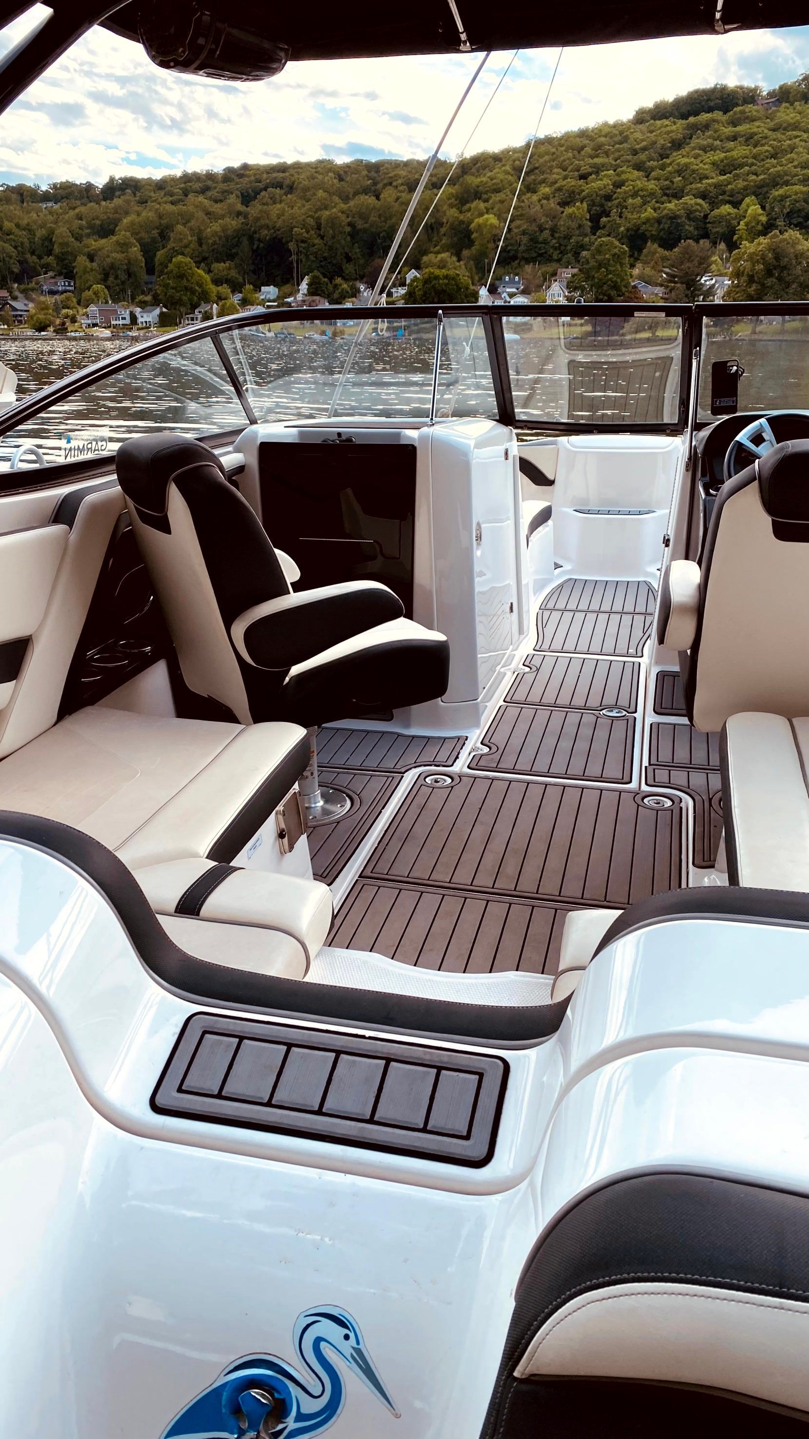 Interior of a 2016 Yamaha AR240 boat with luxurious seating.
