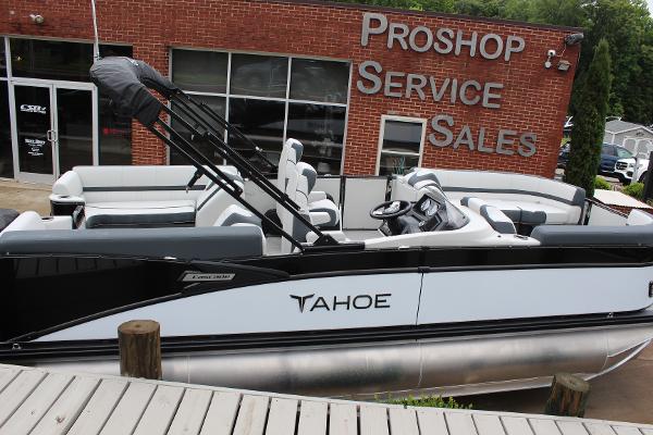 2025 Tahoe Pontoon Cascade Quad Lounger at dealership, showcasing sleek design and modern features.