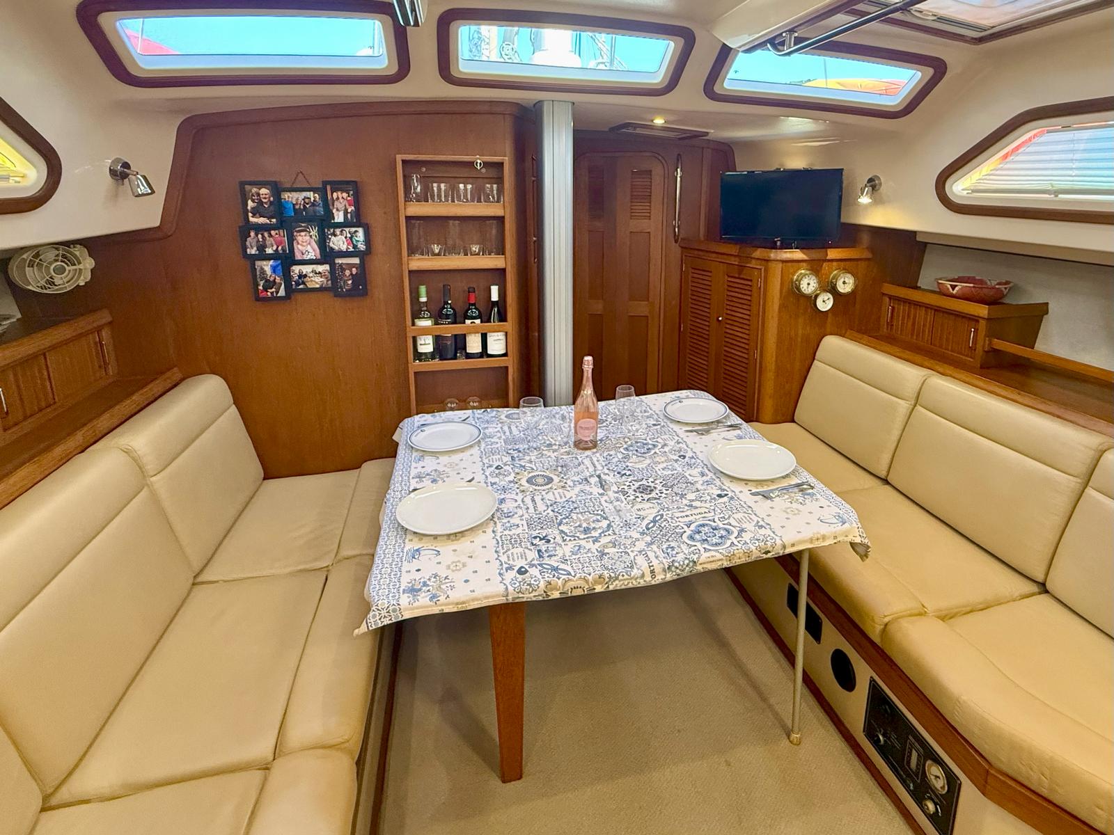 Luxurious 2008 Island Packet 465 yacht interior with dining area and elegant decor.