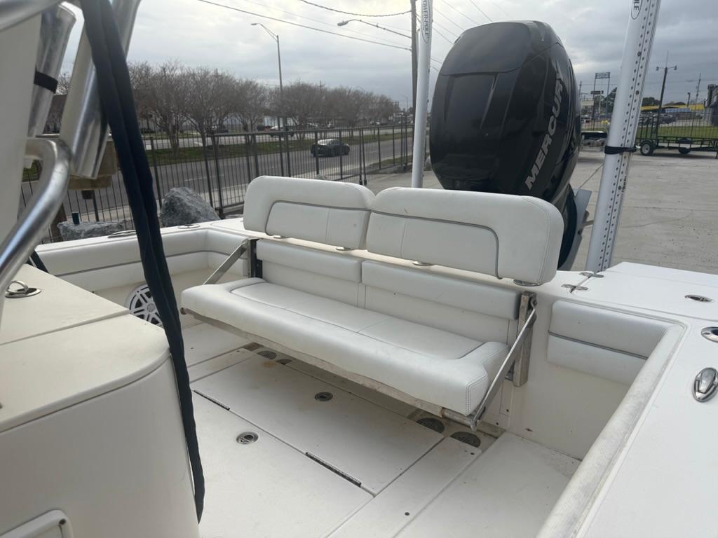 2017 ShearWater 270 Carolina Flare boat with white seating and Mercury engine.