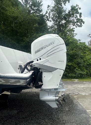 2008 SeaVee 390B boat with Mercury Verado outboard engine, parked outdoors.