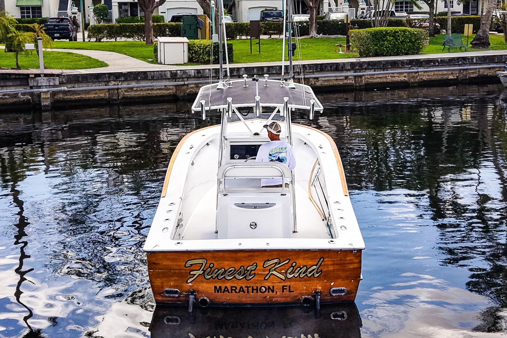 1977 Scarborough 27 CC boat on water, labeled "Finest Kind," Marathon, FL.