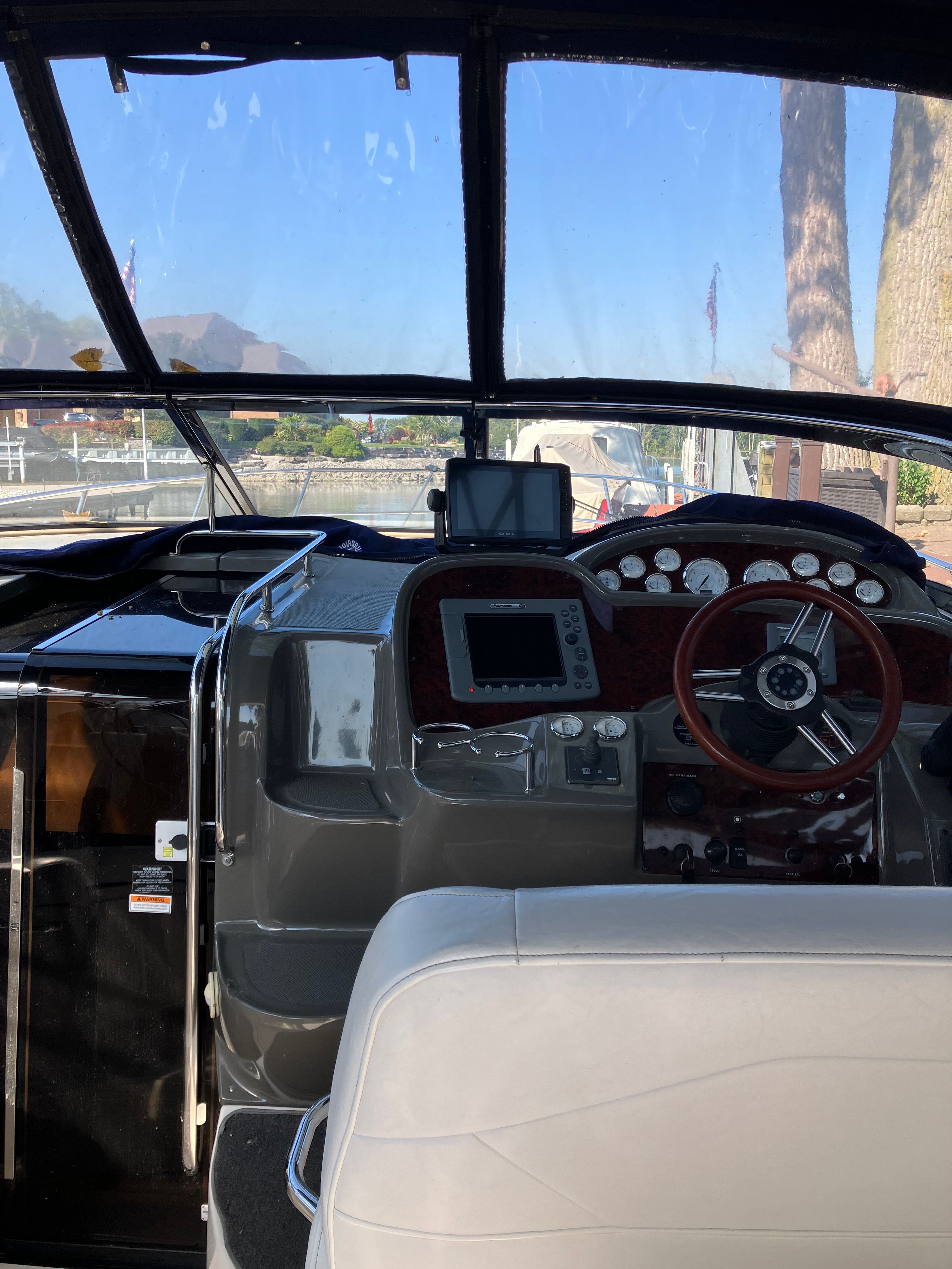 Interior view of a 2008 Custom Commodore boat helm.