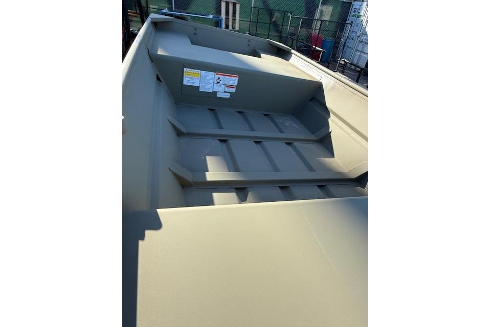 2026 Tracker Grizzly 14 Jon boat interior with seating and storage compartments.