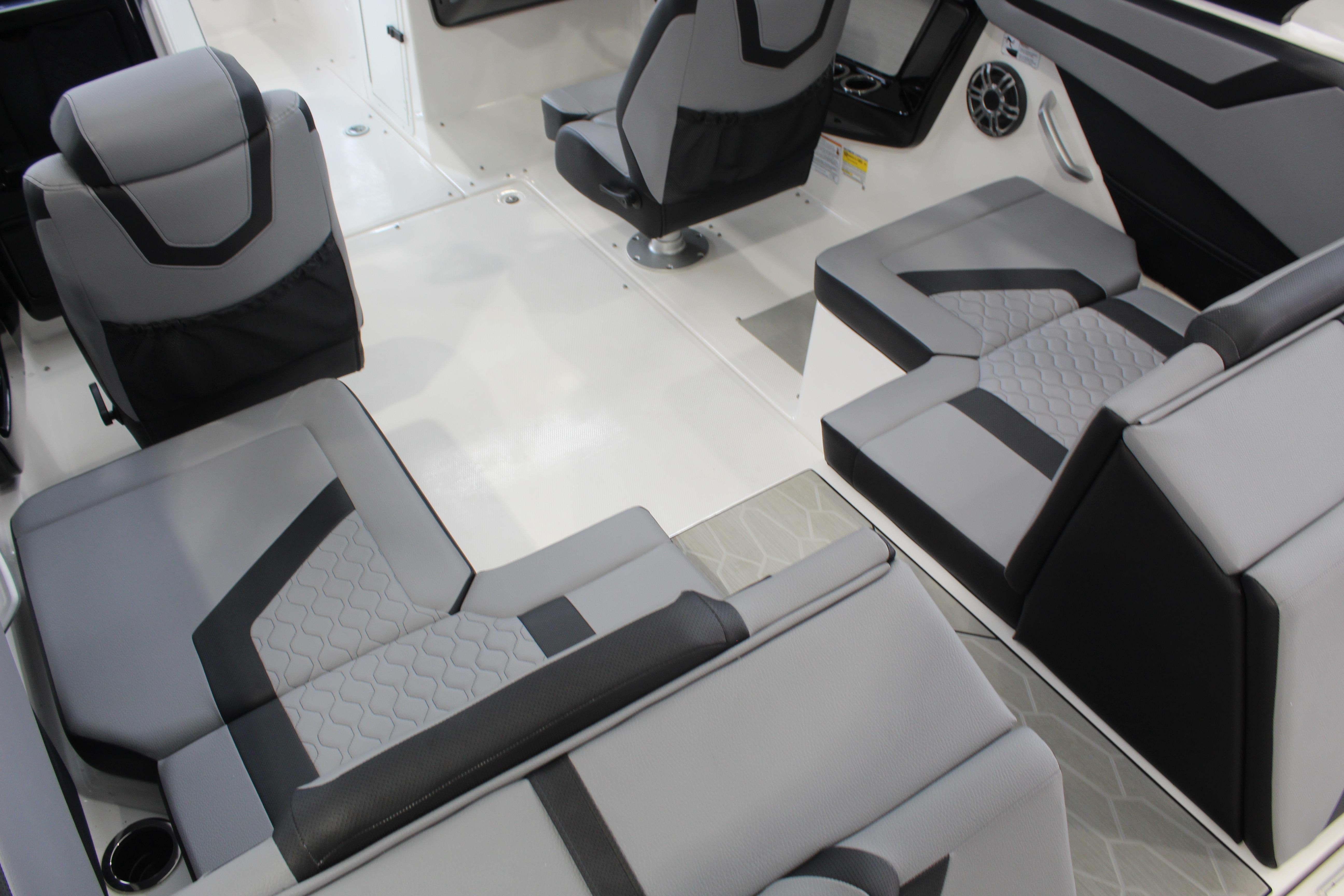 Interior of 2026 Yamaha Boats 222XD, featuring modern gray and black seating design.