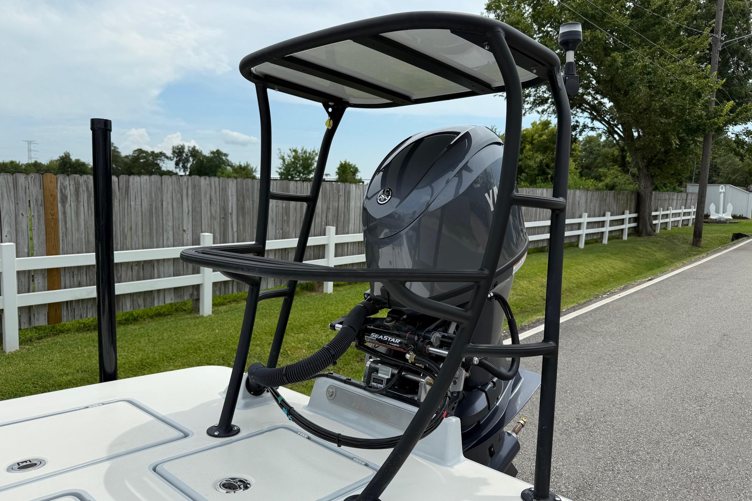 2026 Maverick 17 HPX-S boat with Yamaha outboard motor and elevated platform.