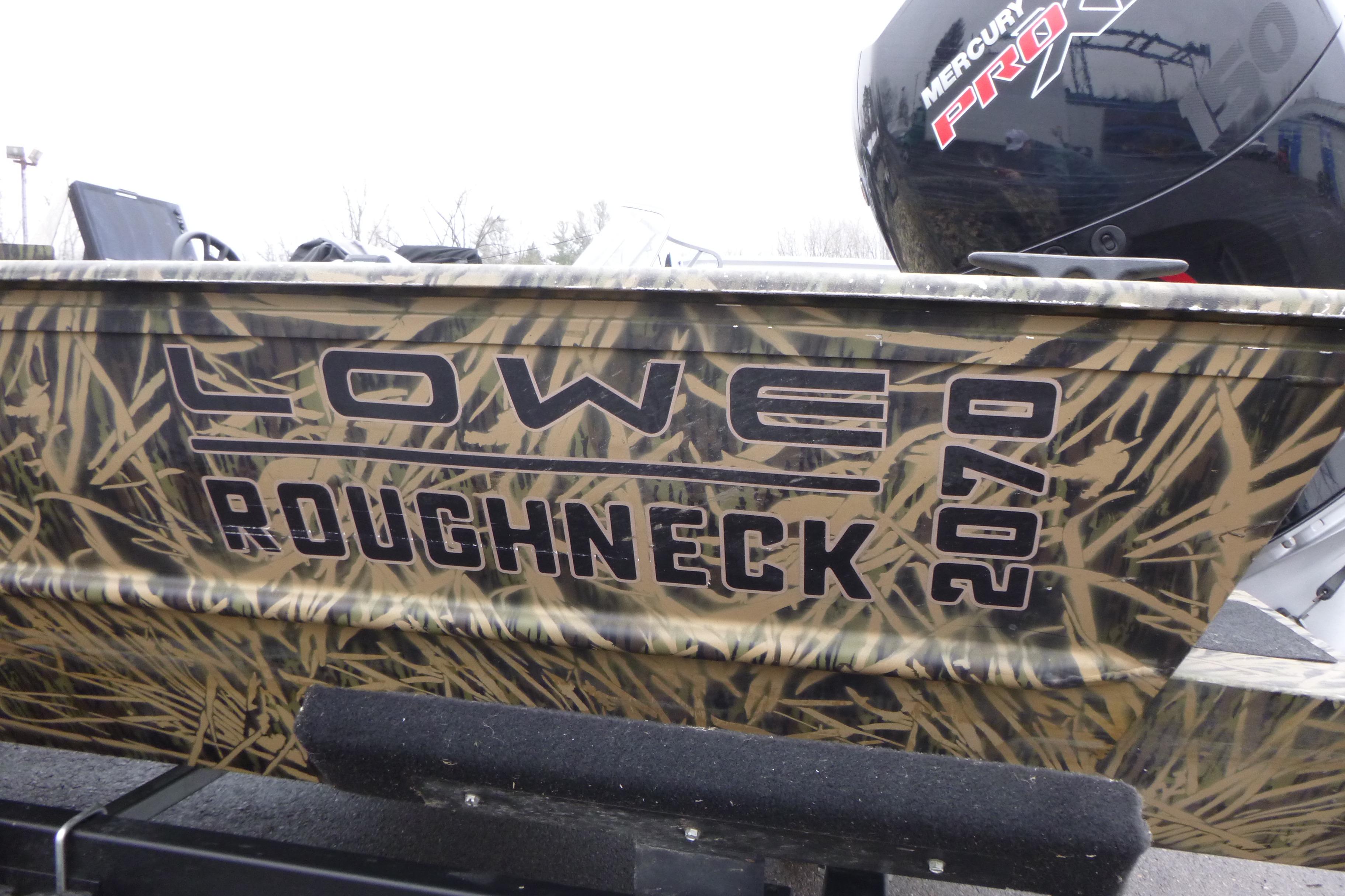 2024 Lowe Roughneck 2070 boat with camouflage design and Mercury Pro motor.