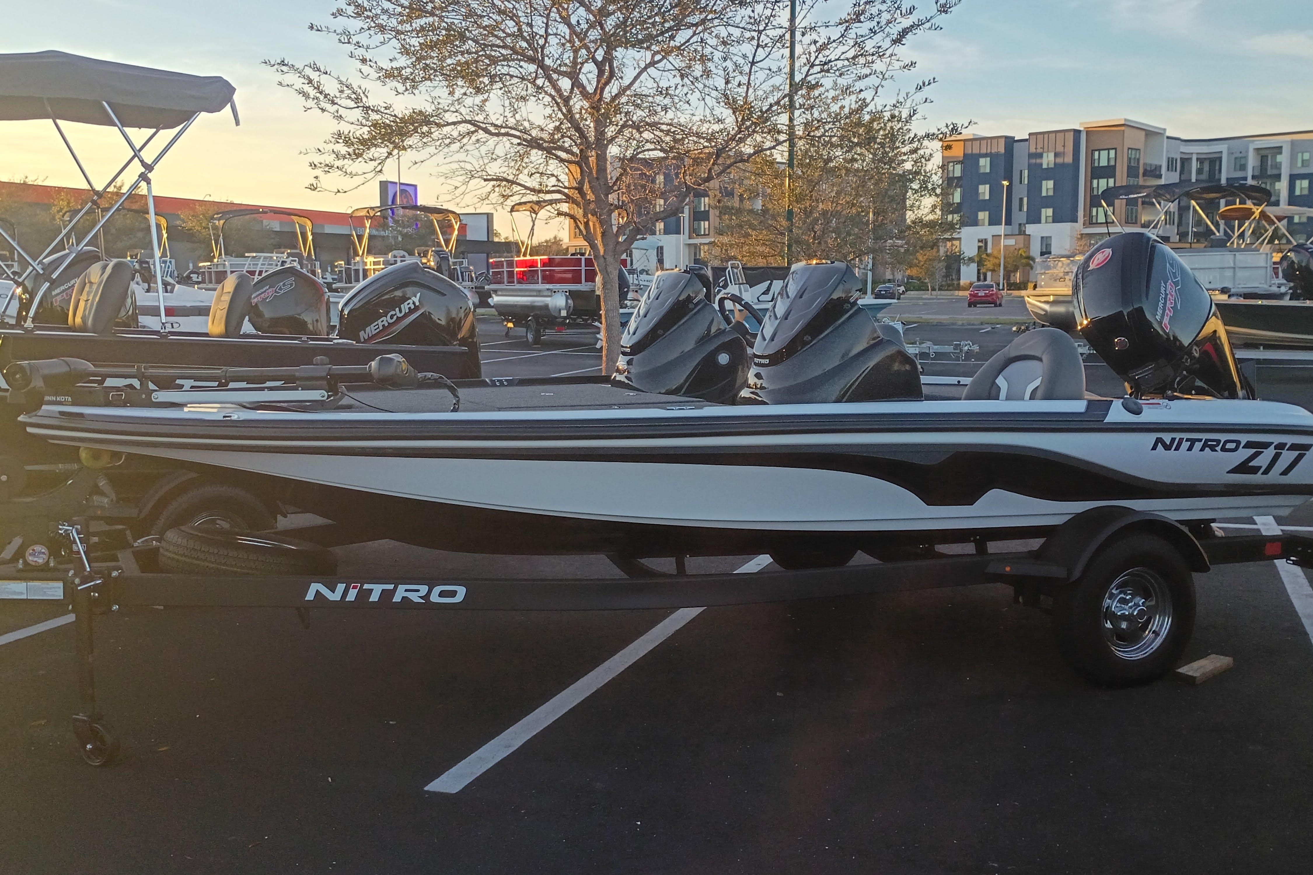 2026 Nitro Z17 boat in parking lot, featuring sleek design and Mercury engine.