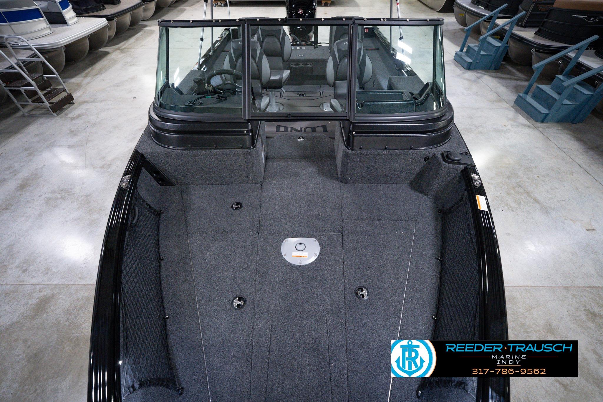 2026 Lund 1875 Impact XS SS boat interior with spacious seating and modern design.