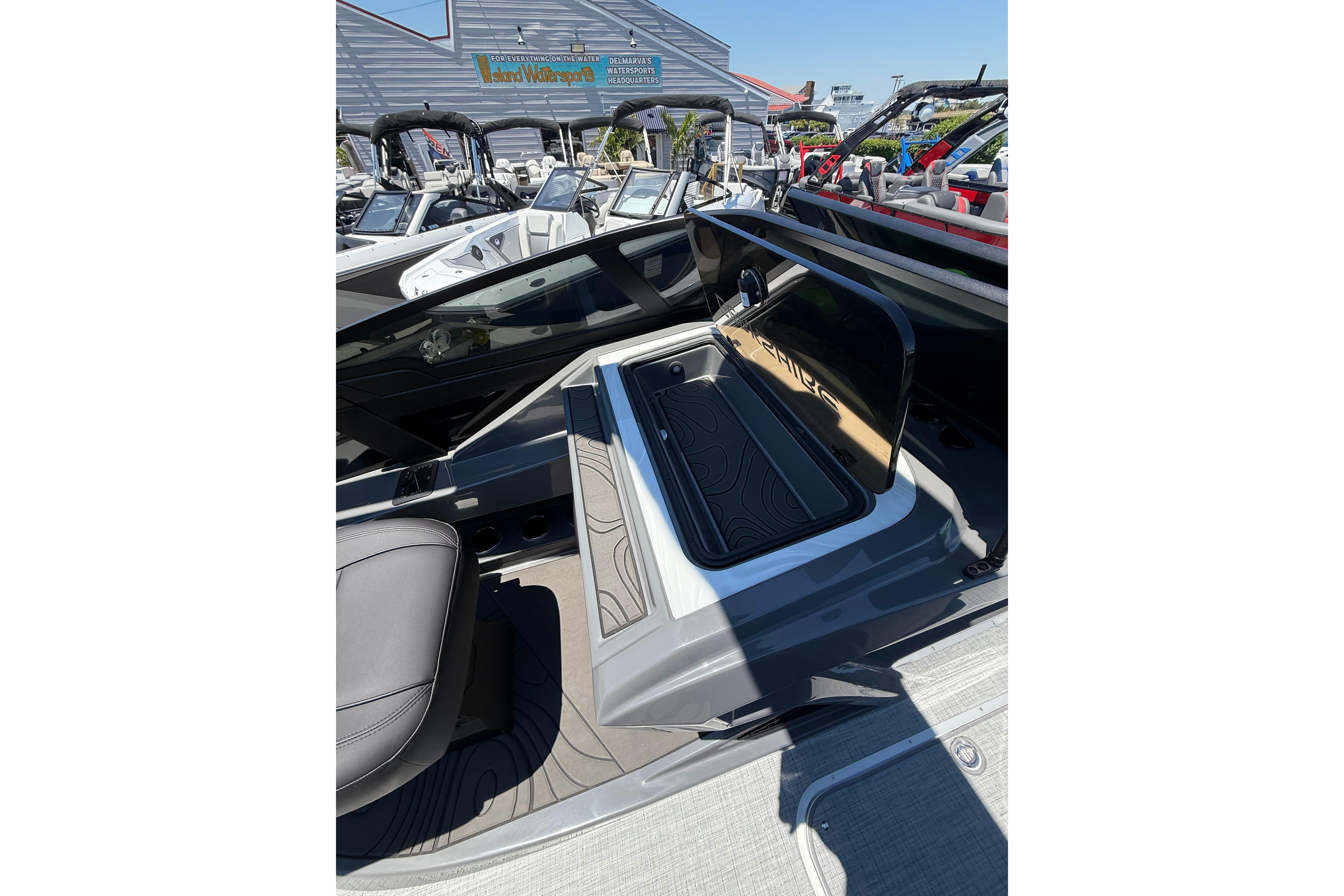 2026 Berkshire Sport SLX9 DC boat interior with sleek seating and storage compartment.