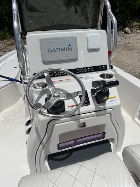 2021 Blue Wave 2200 PureBay boat console with Garmin navigation system.