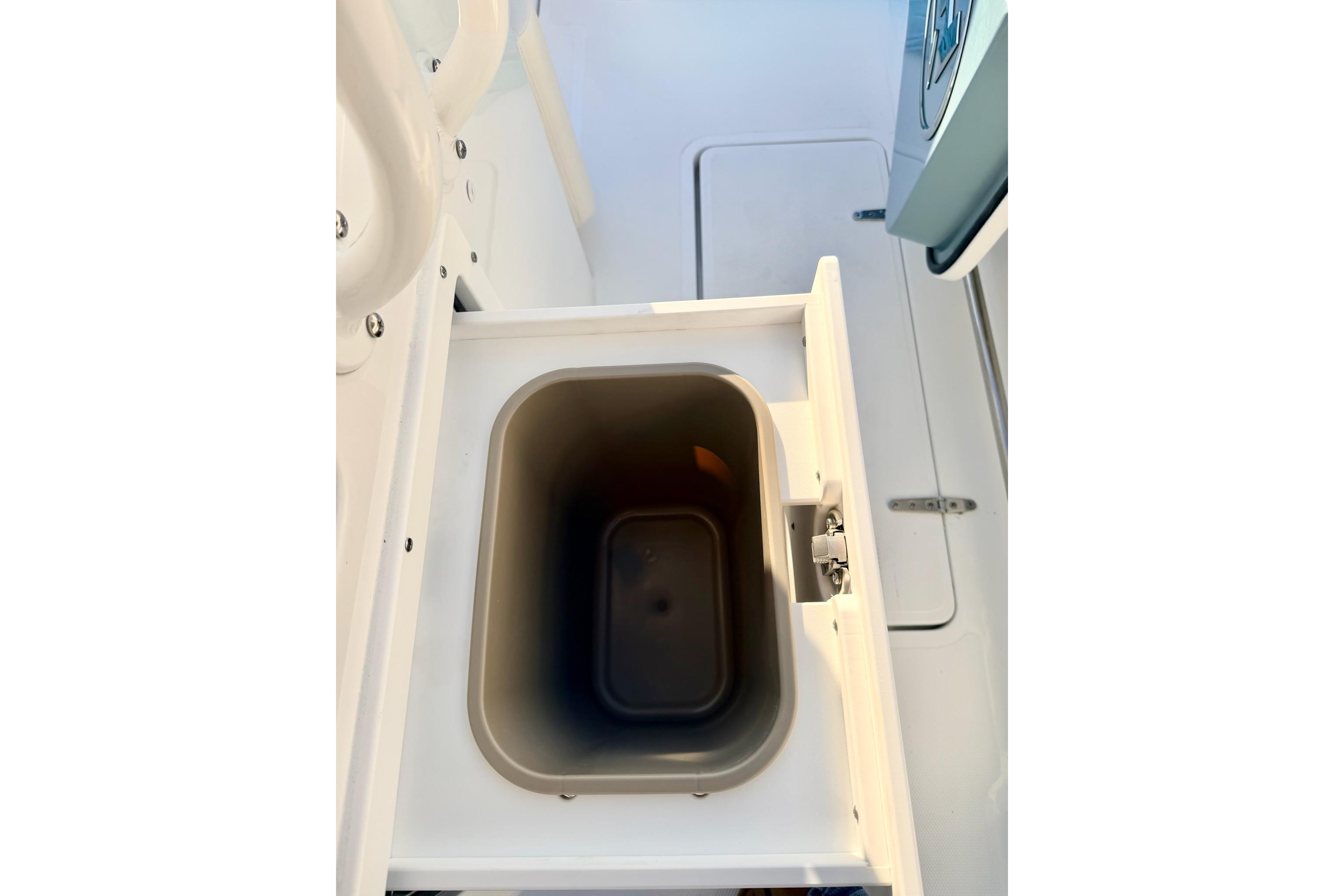 Interior view of 2026 Sea Hunt Ultra 275 Coffin Box storage compartment.