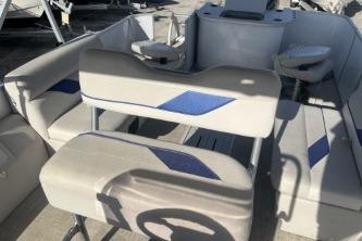 2023 Suntracker G3 Select 322 CC boat interior with seating and steering wheel.